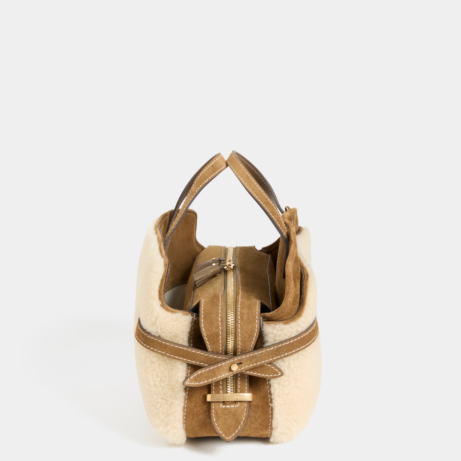 Wilson Shearling Cross-body -

          
            Shearling/Suede Leather in Moutarde -
          

          Anya Hindmarch UK
