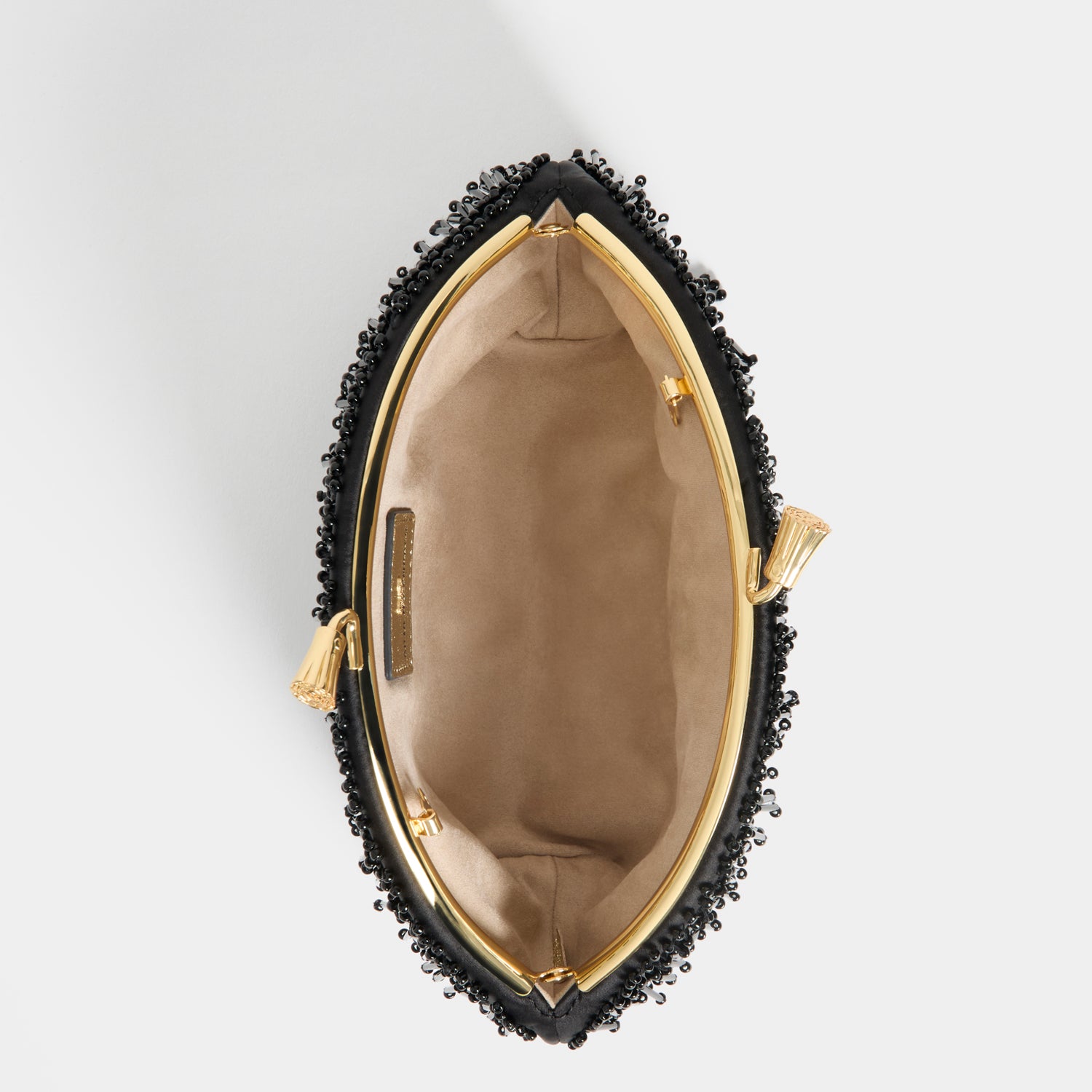 Embellished Eyes Clutch -

          
            Beads in Black -
          

          Anya Hindmarch UK

