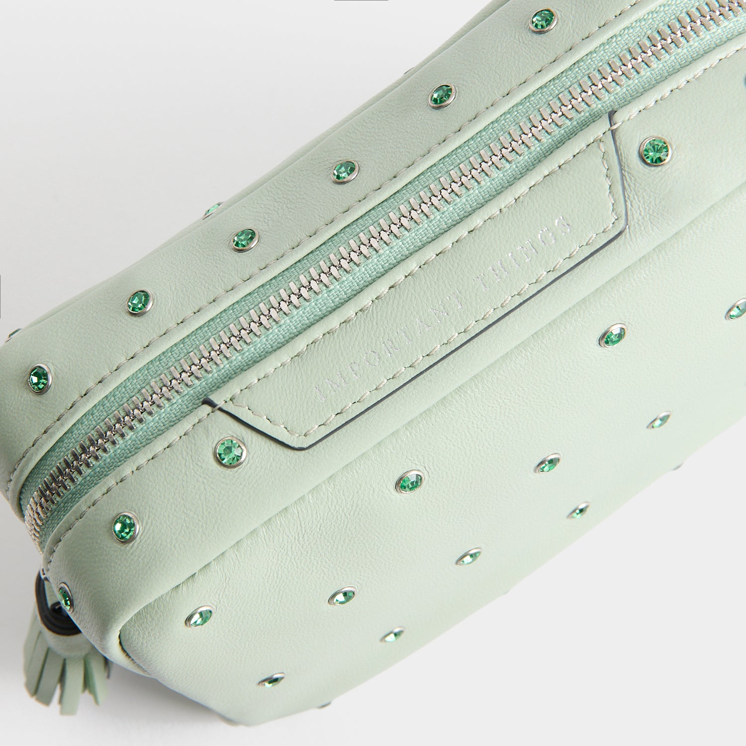 Crystals Important Things Pouch -

          
            Calf leather in Erinite green -
          

          Anya Hindmarch UK
