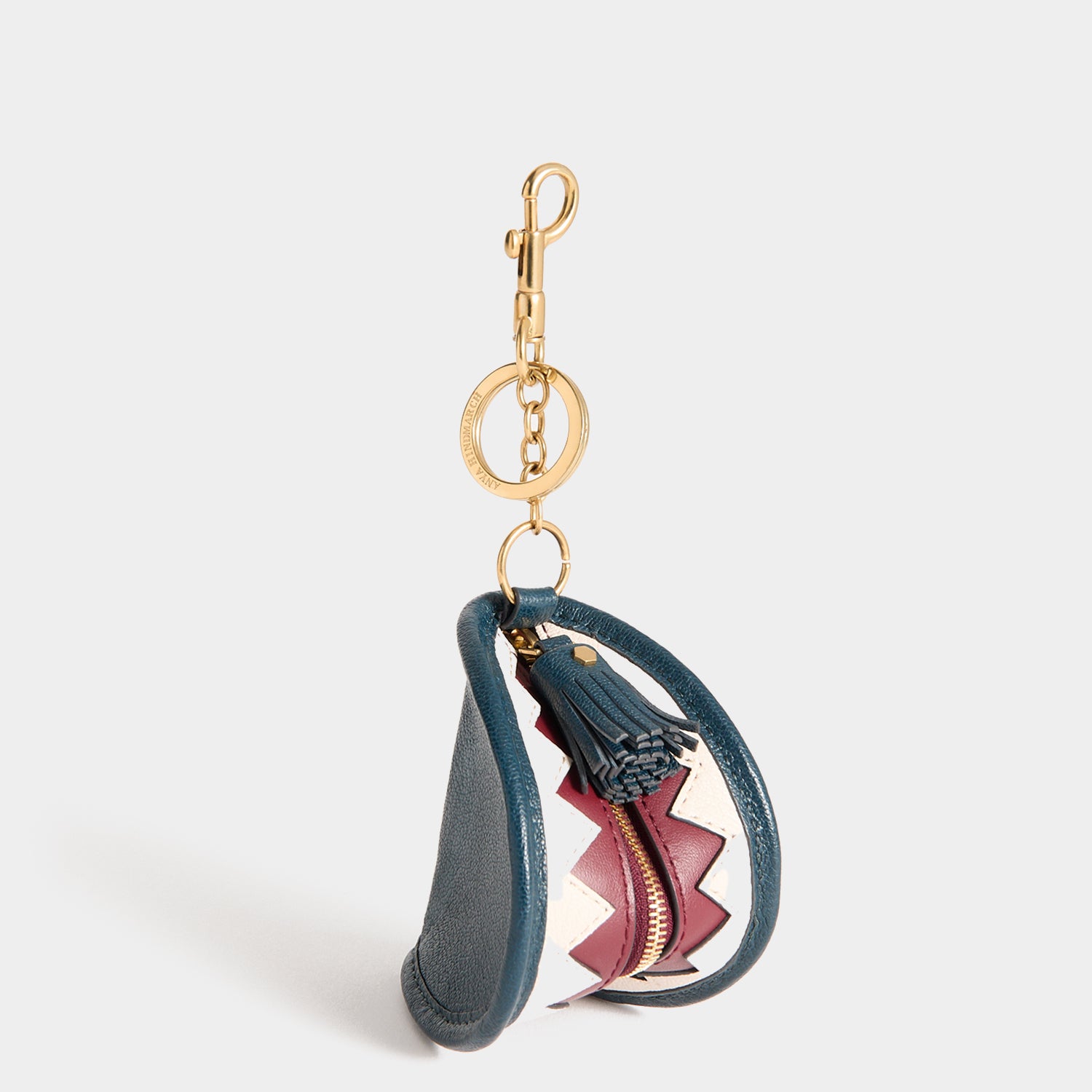Shark Teeth Ear Pods Pouch Charm -

          
            Capra Leather in Petrol Blue -
          

          Anya Hindmarch UK

