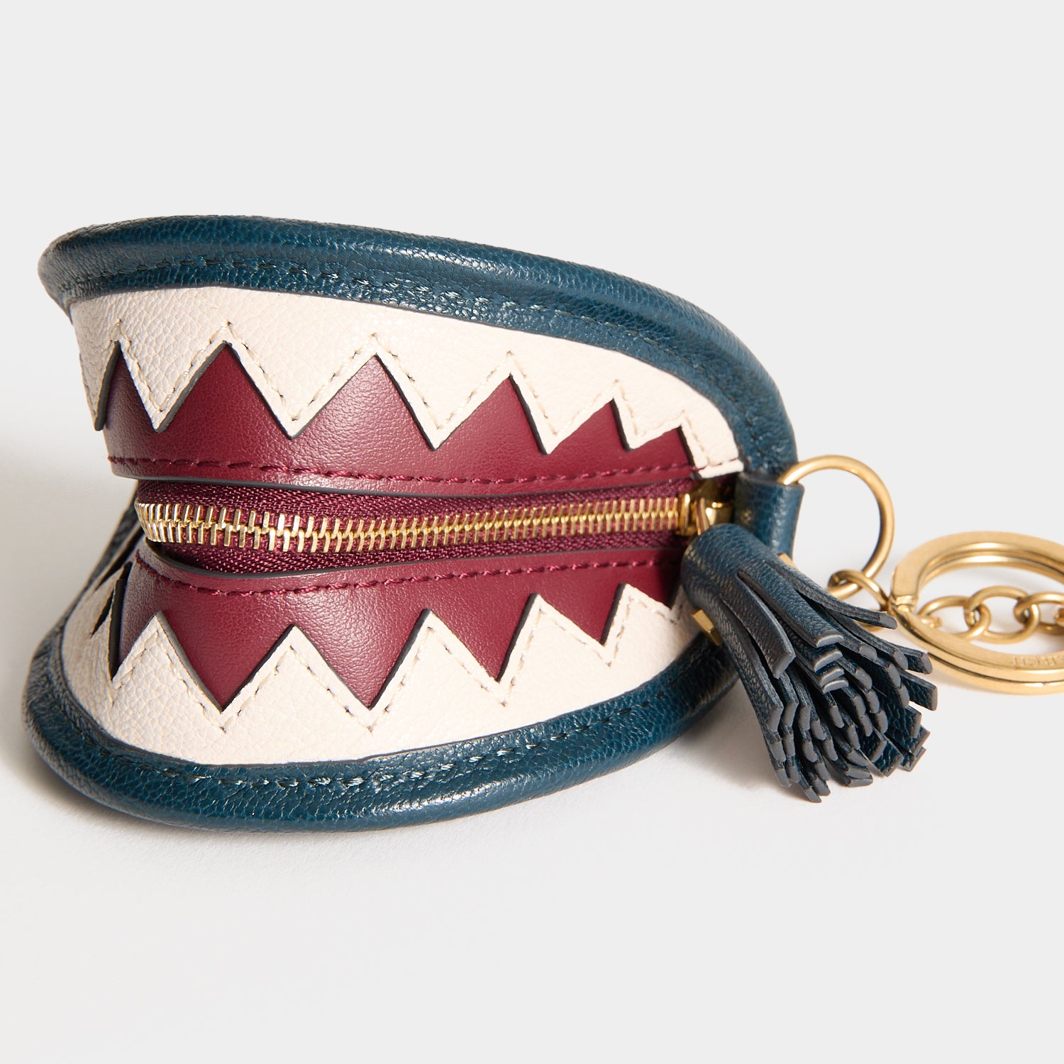 Shark Teeth Ear Pods Pouch Charm -

          
            Capra Leather in Petrol Blue -
          

          Anya Hindmarch UK
