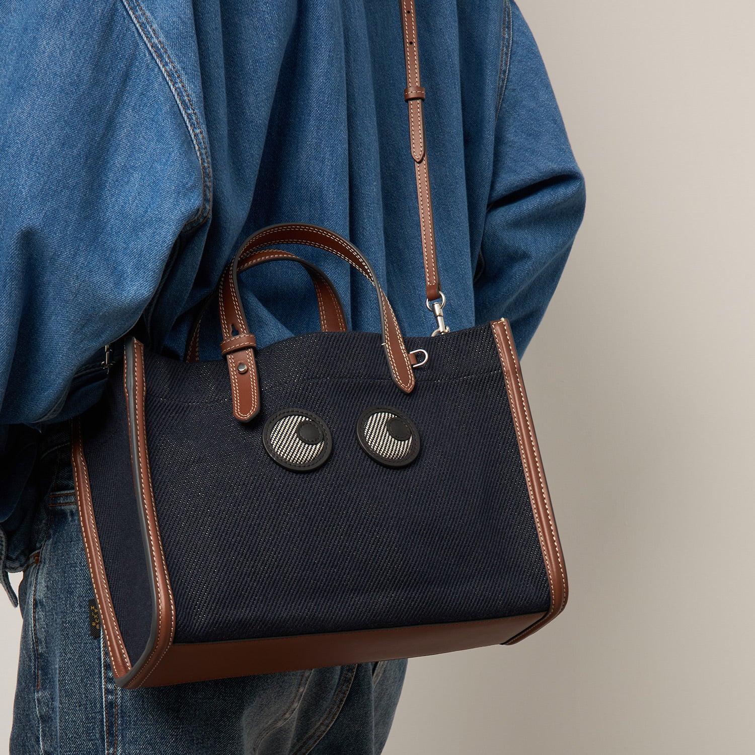 Mini E/W Eyes Tote -

          
            Cotton Drill in Navy -
          

          Anya Hindmarch UK
