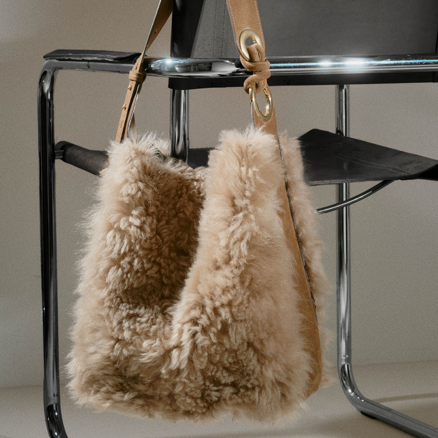 Ringo Shearling Shoulder Bag -

          
            Shearling in Taupe -
          

          Anya Hindmarch UK
