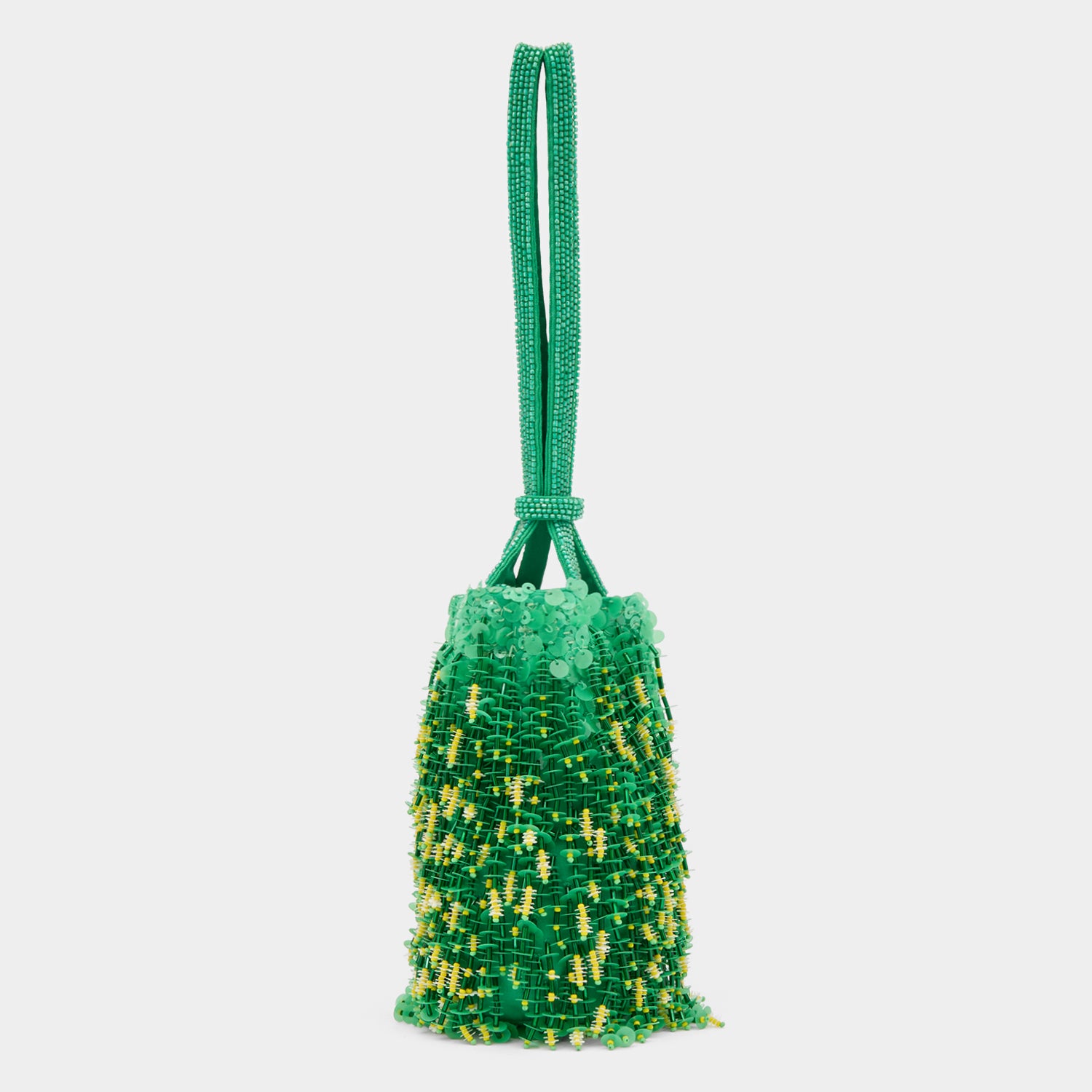 Sequinned green bucket bag with eyes by Anya Hindmarch