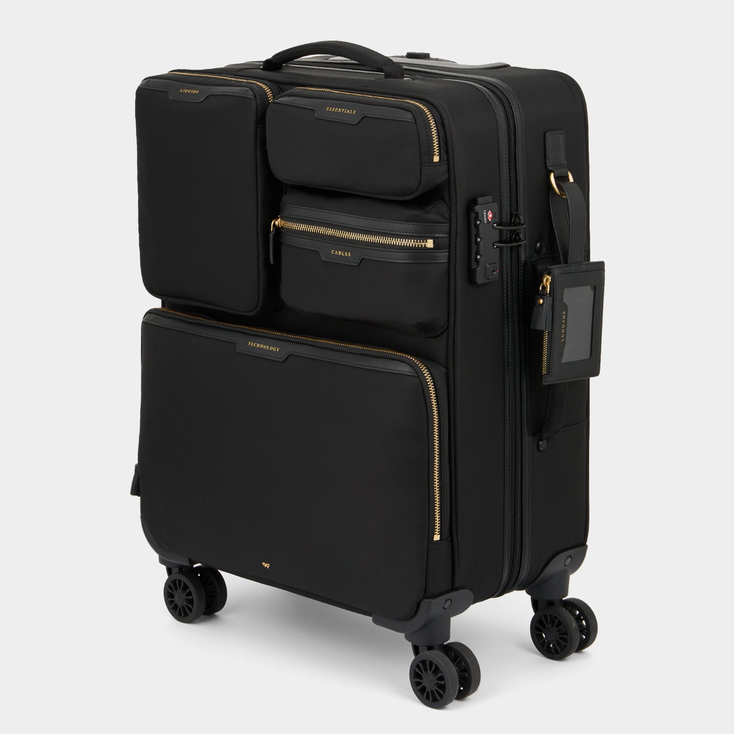 Short-Haul Suitcase -

                  
                    Econyl® Regenerated Nylon in Black -
                  

                  Anya Hindmarch UK
