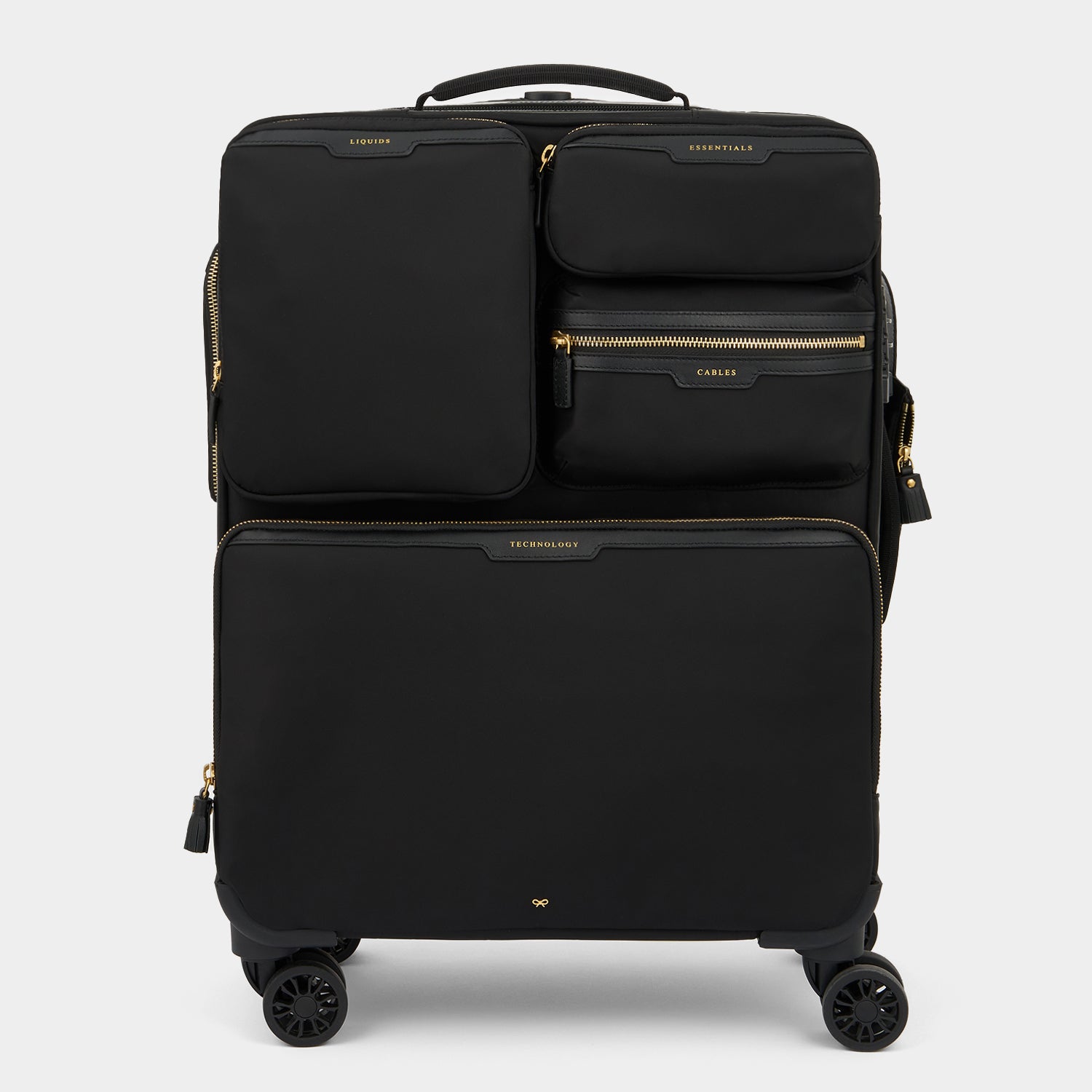 Short-Haul Suitcase -

                  
                    Econyl® Regenerated Nylon in Black -
                  

                  Anya Hindmarch UK
