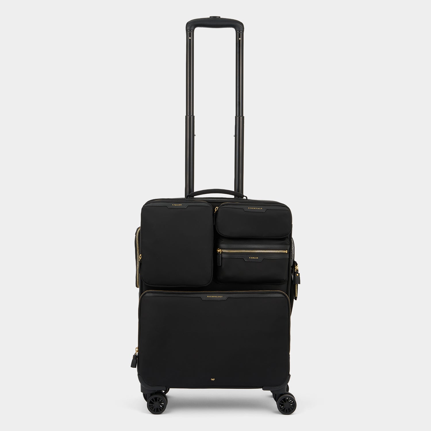 Short-Haul Suitcase -

                  
                    Econyl® Regenerated Nylon in Black -
                  

                  Anya Hindmarch UK
