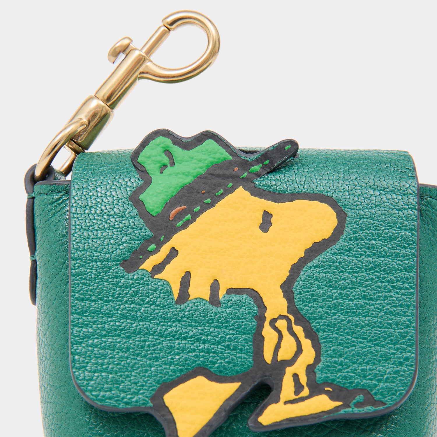 Peanuts Woodstock Ear Pods Pouch -

          
            Capra Leather in Yellow -
          

          Anya Hindmarch UK
