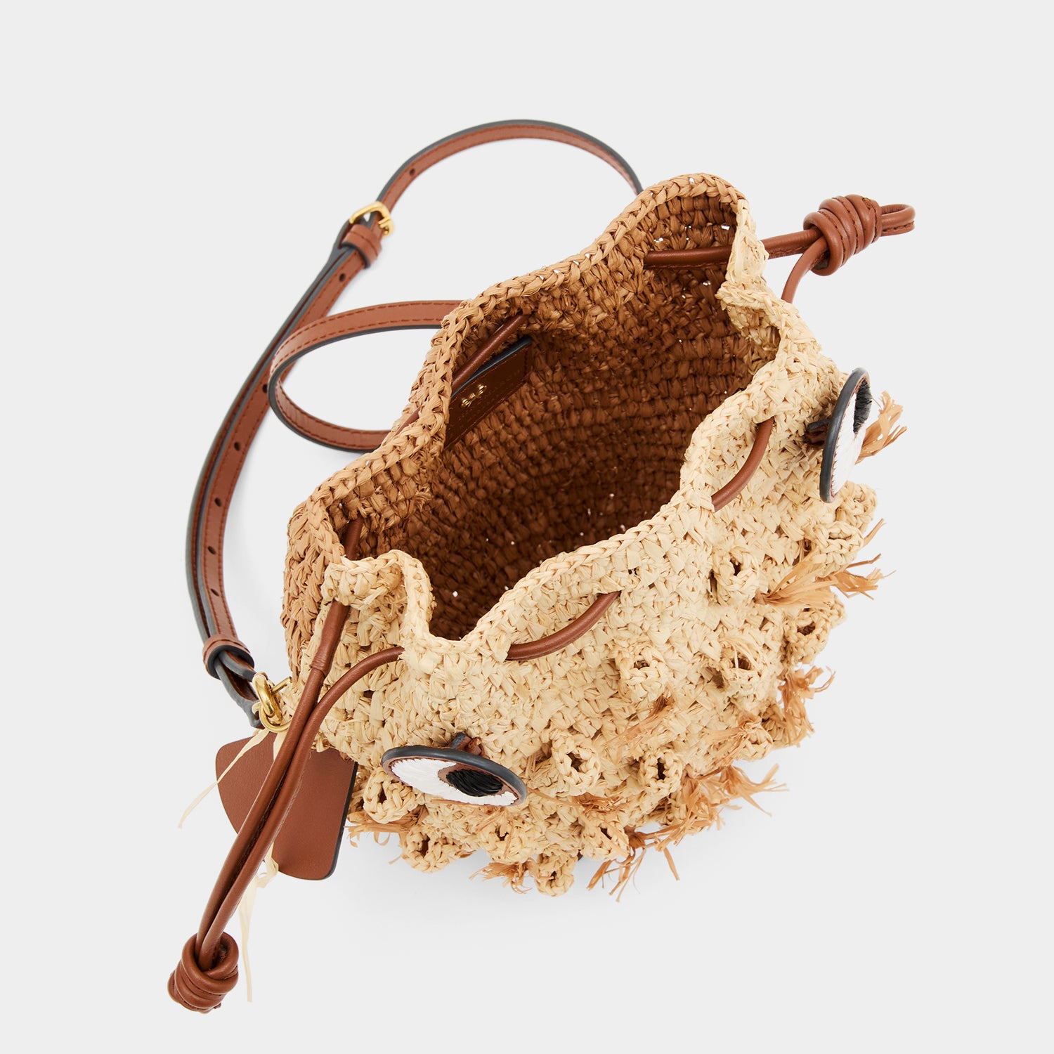 Raffia Blowfish Cross-body -

          
            Natural Raffia/Smooth Leather in Natural -
          

          Anya Hindmarch UK
