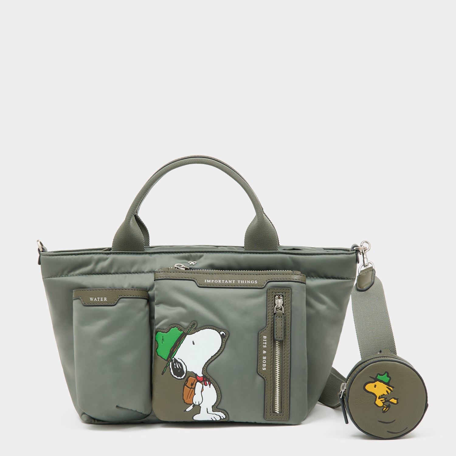 Peanuts Snoopy E/W Mini Tote -

          
            Recycled padded fabric in Fern Green -
          

          Anya Hindmarch UK
