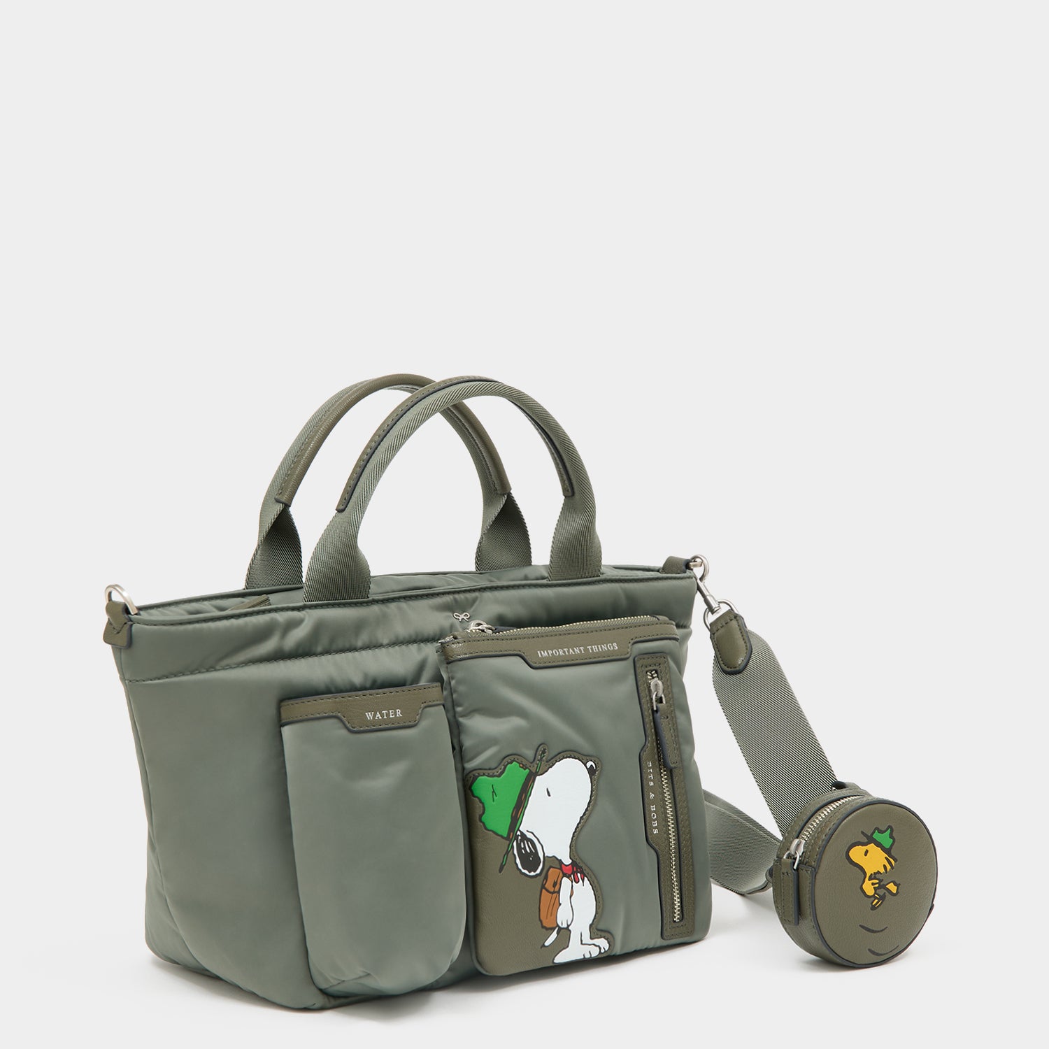 Peanuts Snoopy E/W Mini Tote -

          
            Recycled padded fabric in Fern Green -
          

          Anya Hindmarch UK

