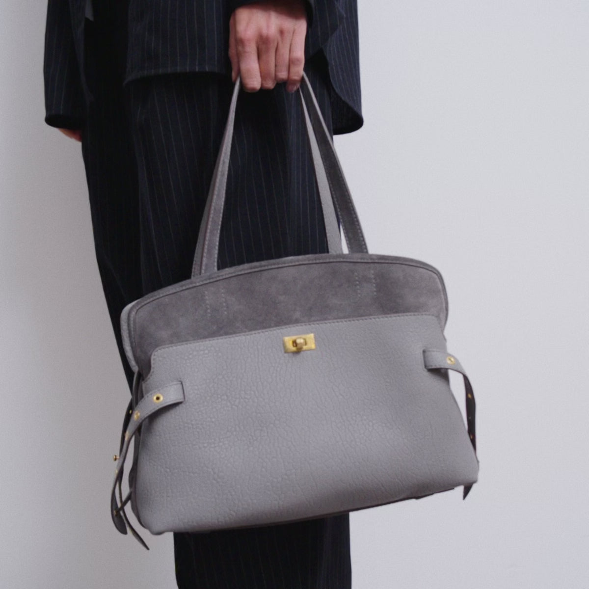 Wilson Eyelet Shoulder Bag -

          
            Suede Leather in Stone Grey -
          

          Anya Hindmarch UK
