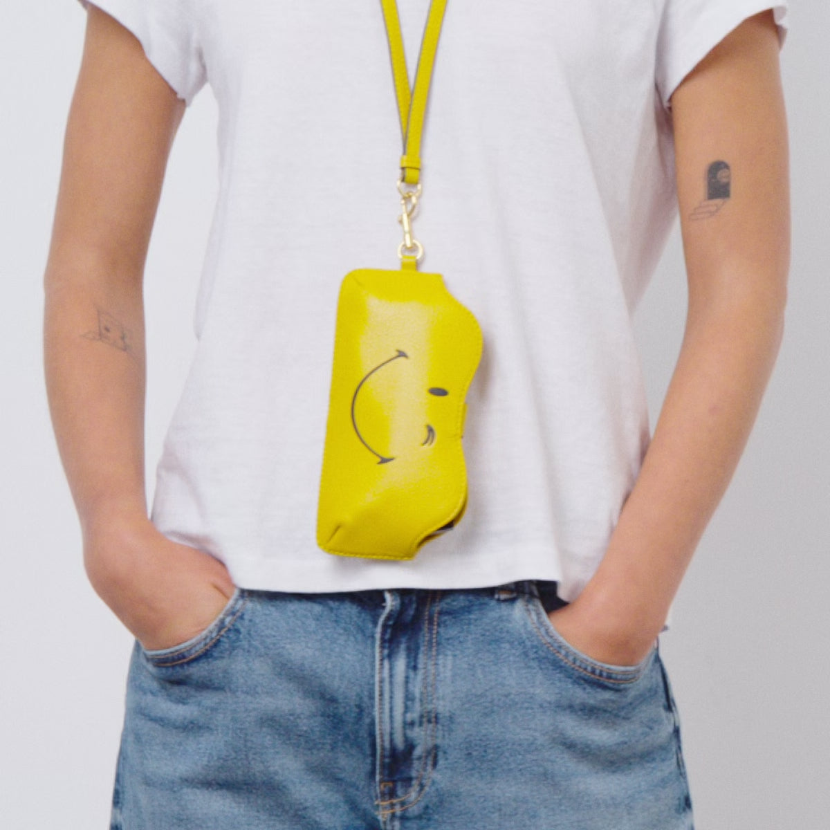 Wink Sunglasses Holder -

          
            Capra Leather in Mustard Yellow -
          

          Anya Hindmarch UK

