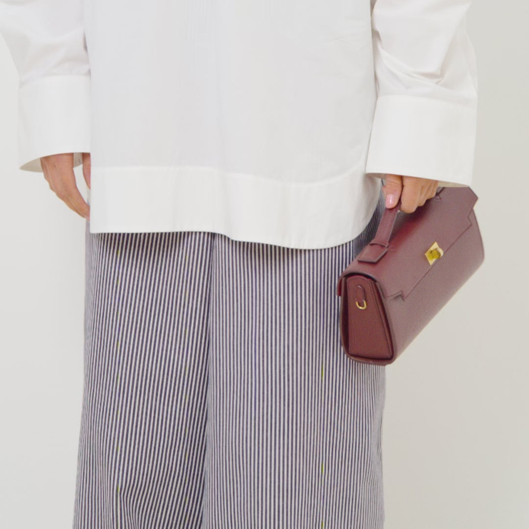 Mortimer Clutch -

          
            Crosshatch Leather in Barolo Red  -
          

          Anya Hindmarch UK
