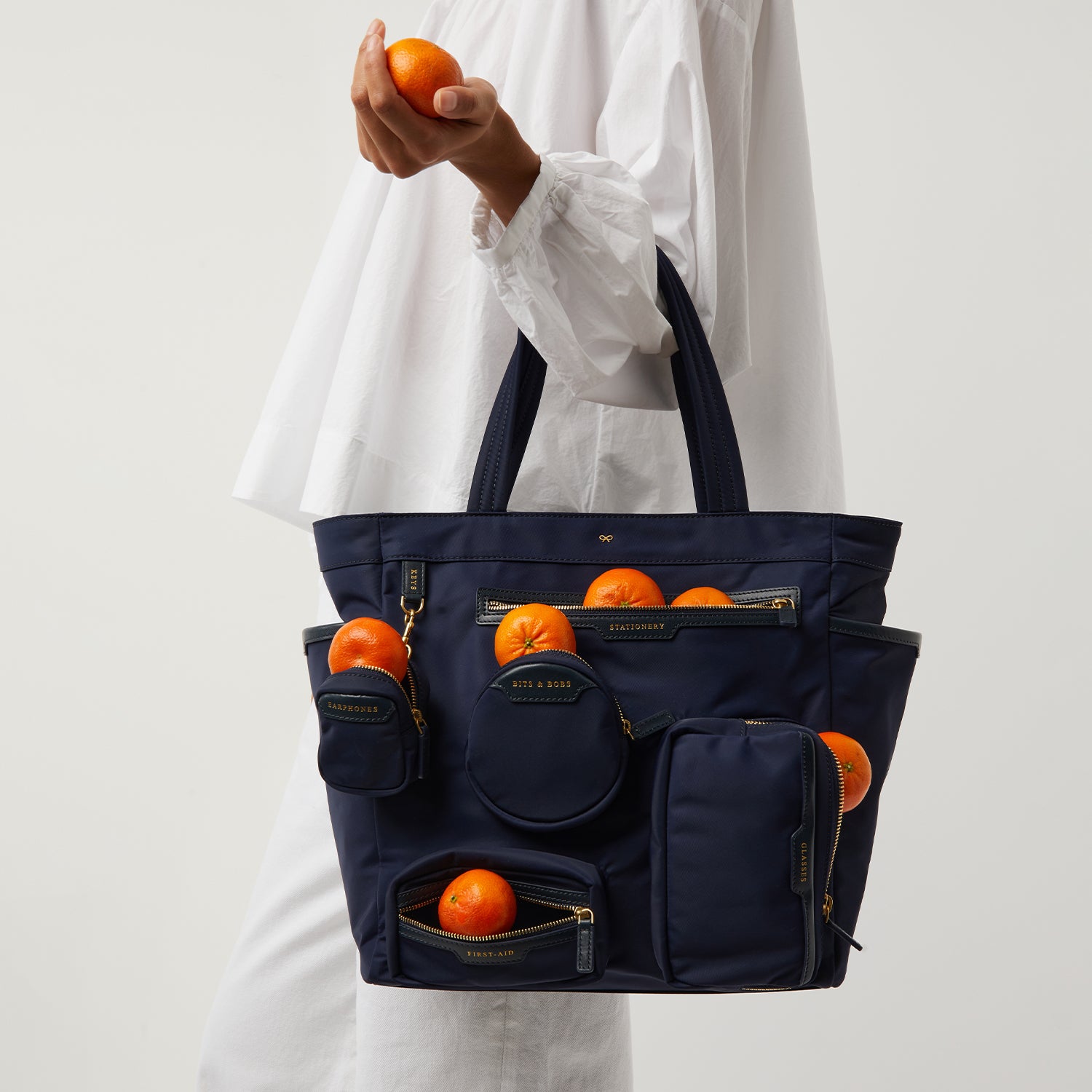 Commuter Tote -

                  
                    Regenerated Econyl® in Marine -
                  

                  Anya Hindmarch UK
