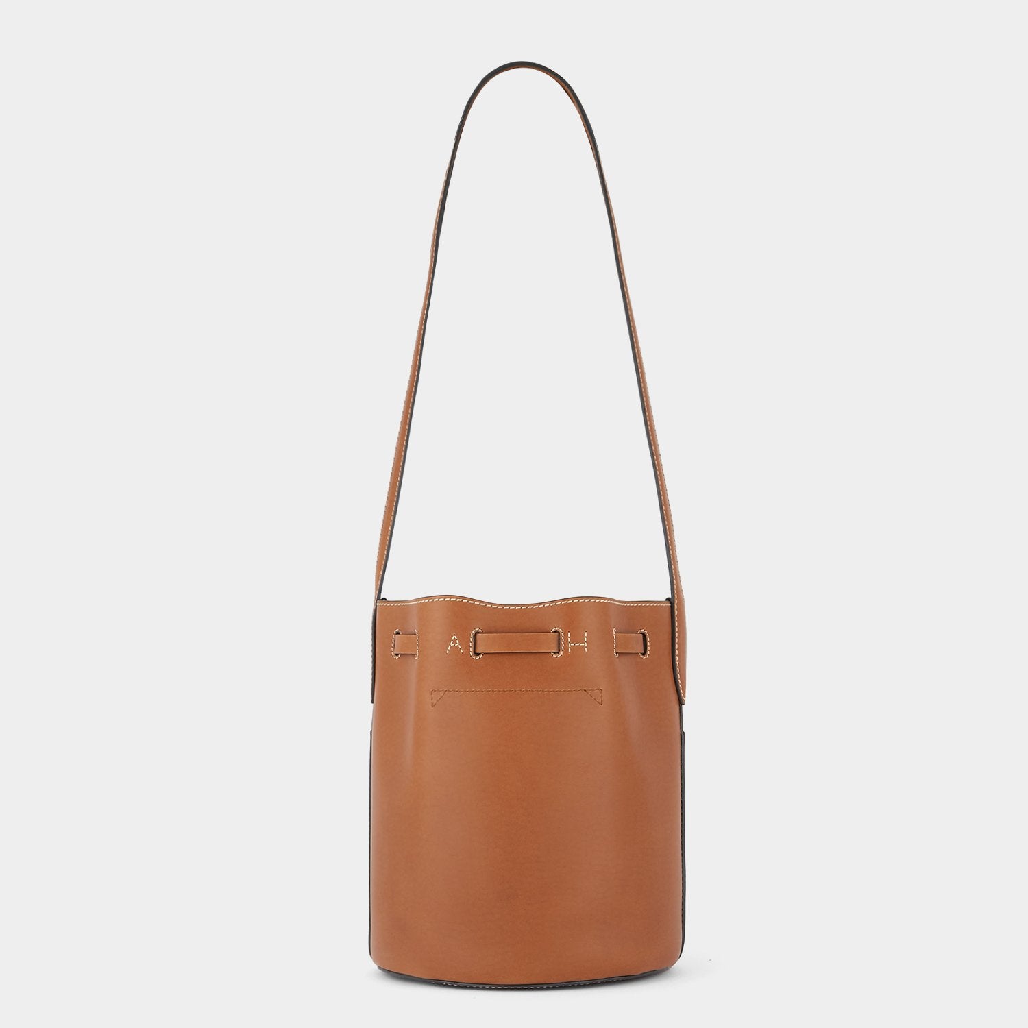 Return to Nature Small Bucket Bag -

                  
                    Compostable Leather in Tan -
                  

                  Anya Hindmarch UK
