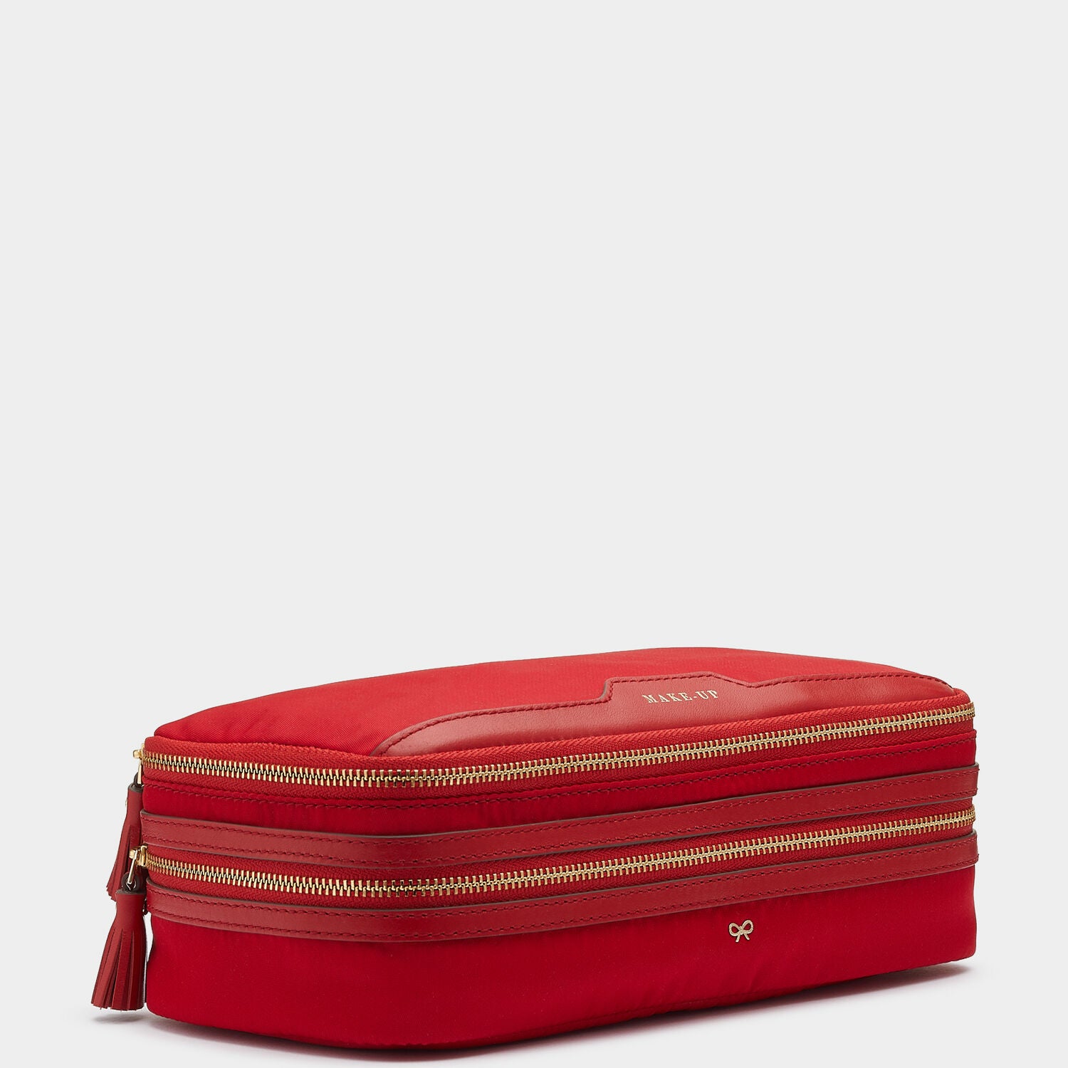 Make-Up Pouch -

                  
                    Recycled Nylon in Red -
                  

                  Anya Hindmarch UK
