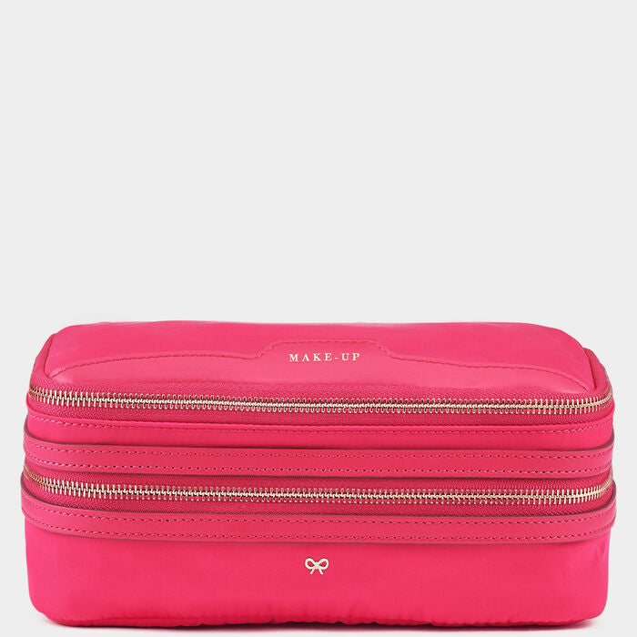 Make-Up Pouch -

                  
                    Econyl® Regenerated Nylon in Hot Pink -
                  

                  Anya Hindmarch UK
