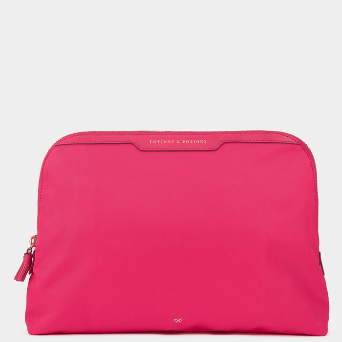 Lotions and Potions Pouch -

                  
                    Econyl® in Hot Pink -
                  

                  Anya Hindmarch UK
