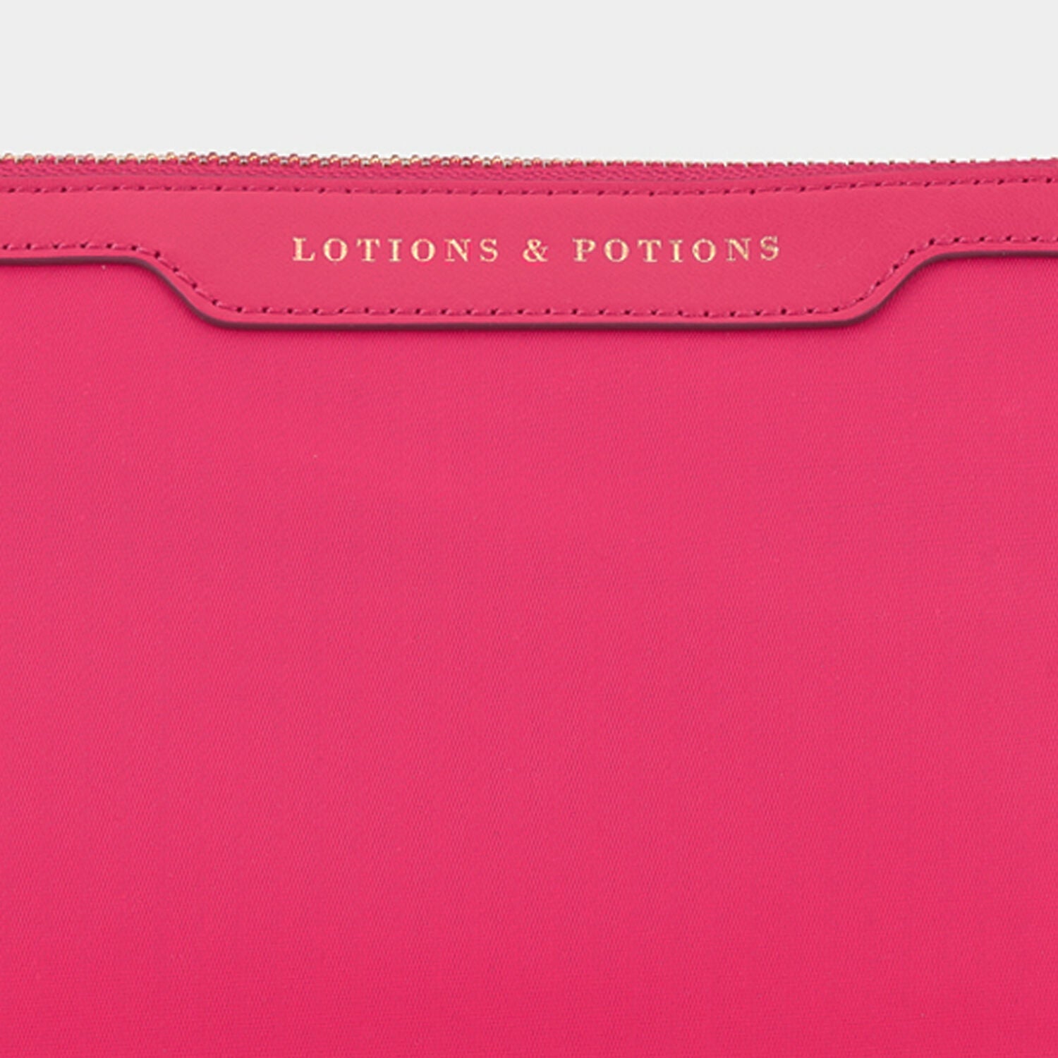 Lotions and Potions Pouch -

                  
                    ECONYL® in Hot Pink -
                  

                  Anya Hindmarch UK
