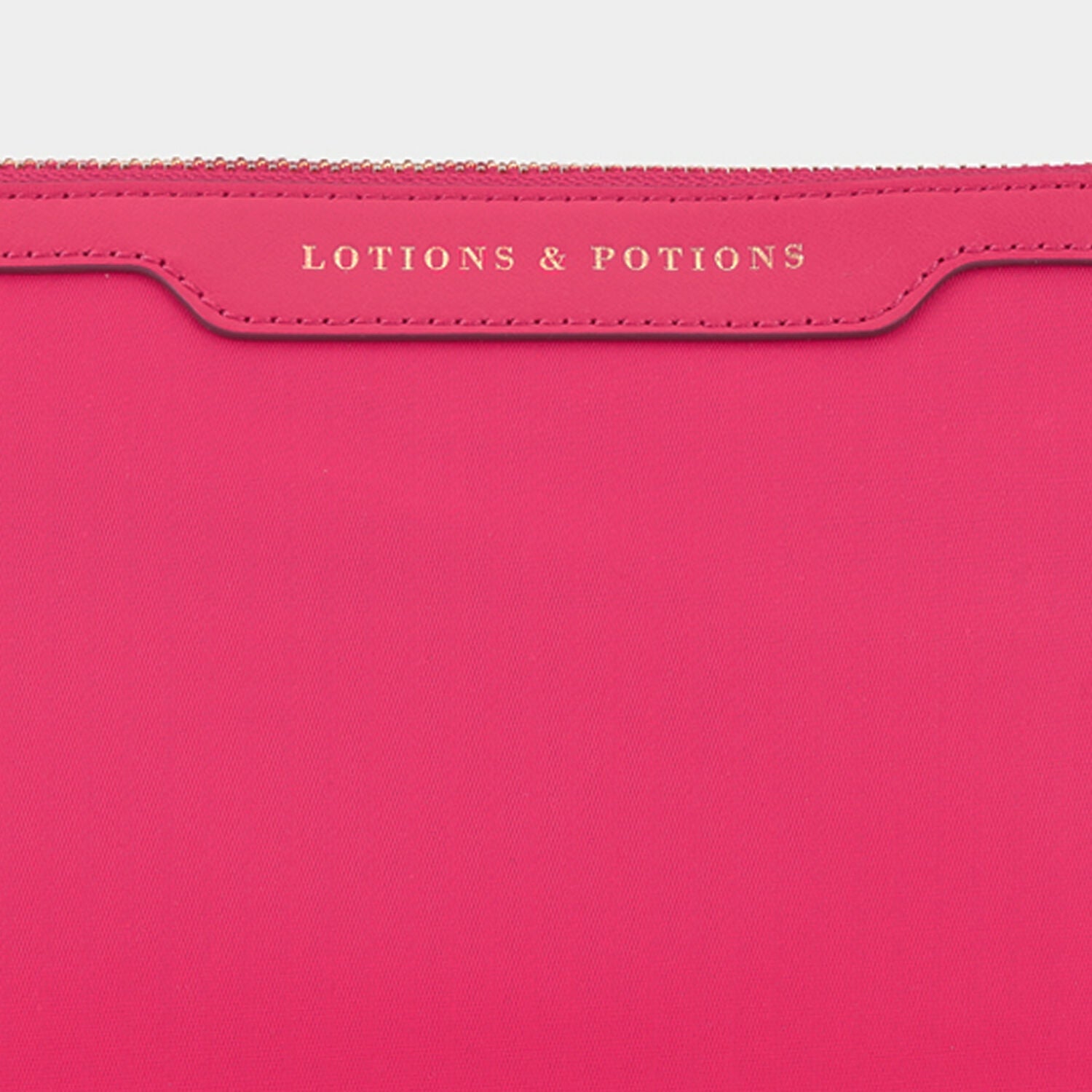 Lotions and Potions Pouch -

                  
                    Econyl® in Hot Pink -
                  

                  Anya Hindmarch UK
