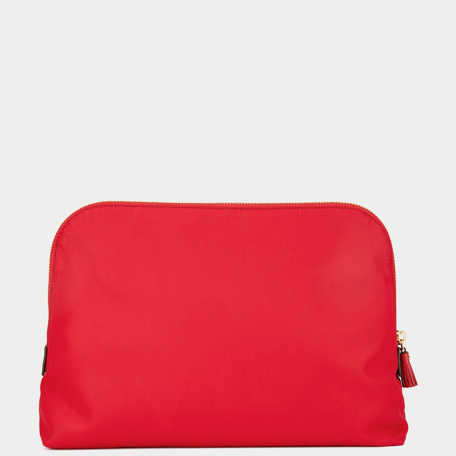 Lotions and Potions Pouch -

                  
                    ECONYL® in Red -
                  

                  Anya Hindmarch UK
