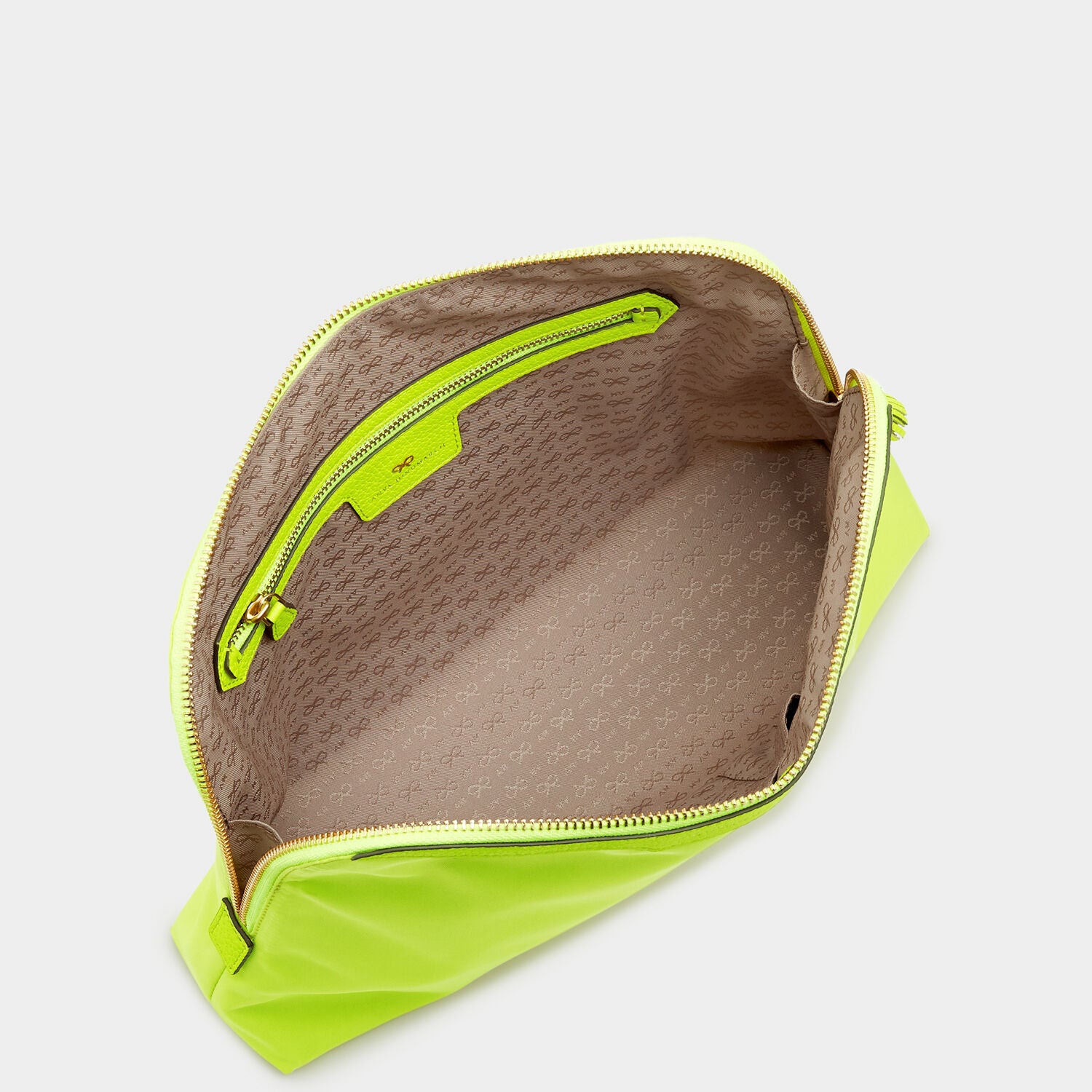 Lotions and Potions Pouch -

                  
                    ECONYL® in Neon Yellow -
                  

                  Anya Hindmarch UK
