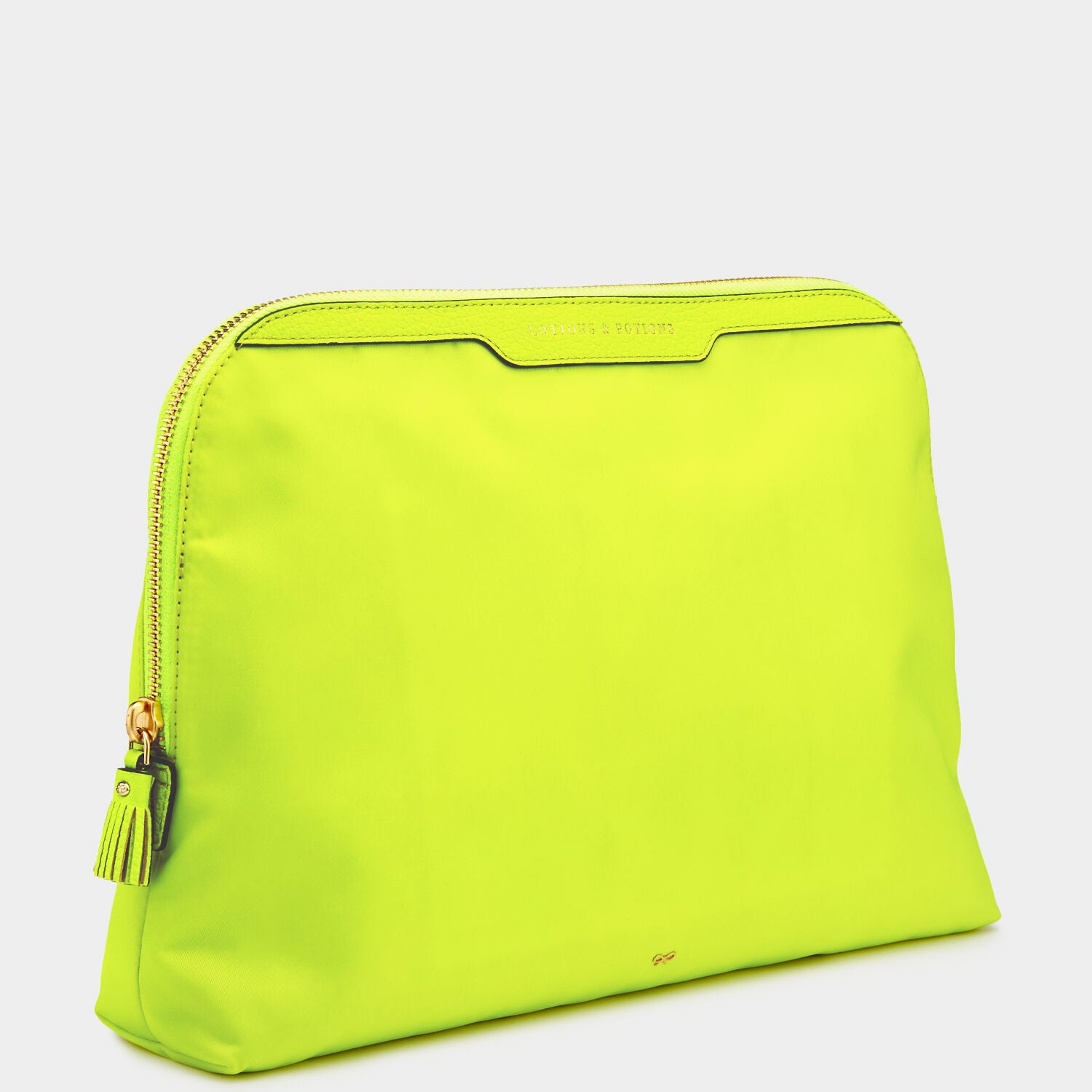 Lotions and Potions Pouch -

                  
                    ECONYL® in Neon Yellow -
                  

                  Anya Hindmarch UK
