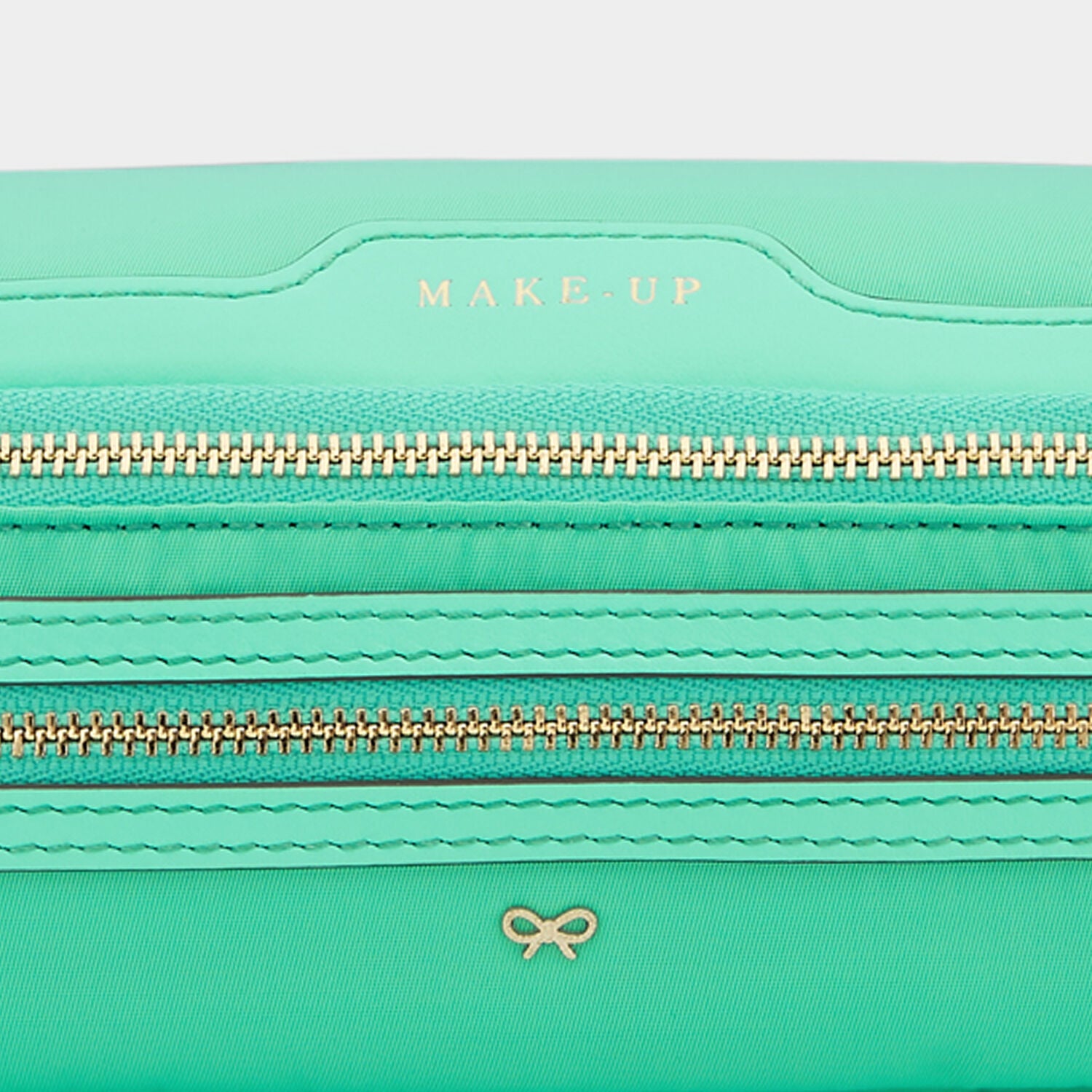 Make-Up Pouch -

                  
                    Regenerated ECONYL® in Arsenic -
                  

                  Anya Hindmarch UK
