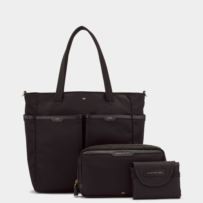 Baby Bag -

                  
                    Econyl® Regenerated Nylon in Black -
                  

                  Anya Hindmarch UK
