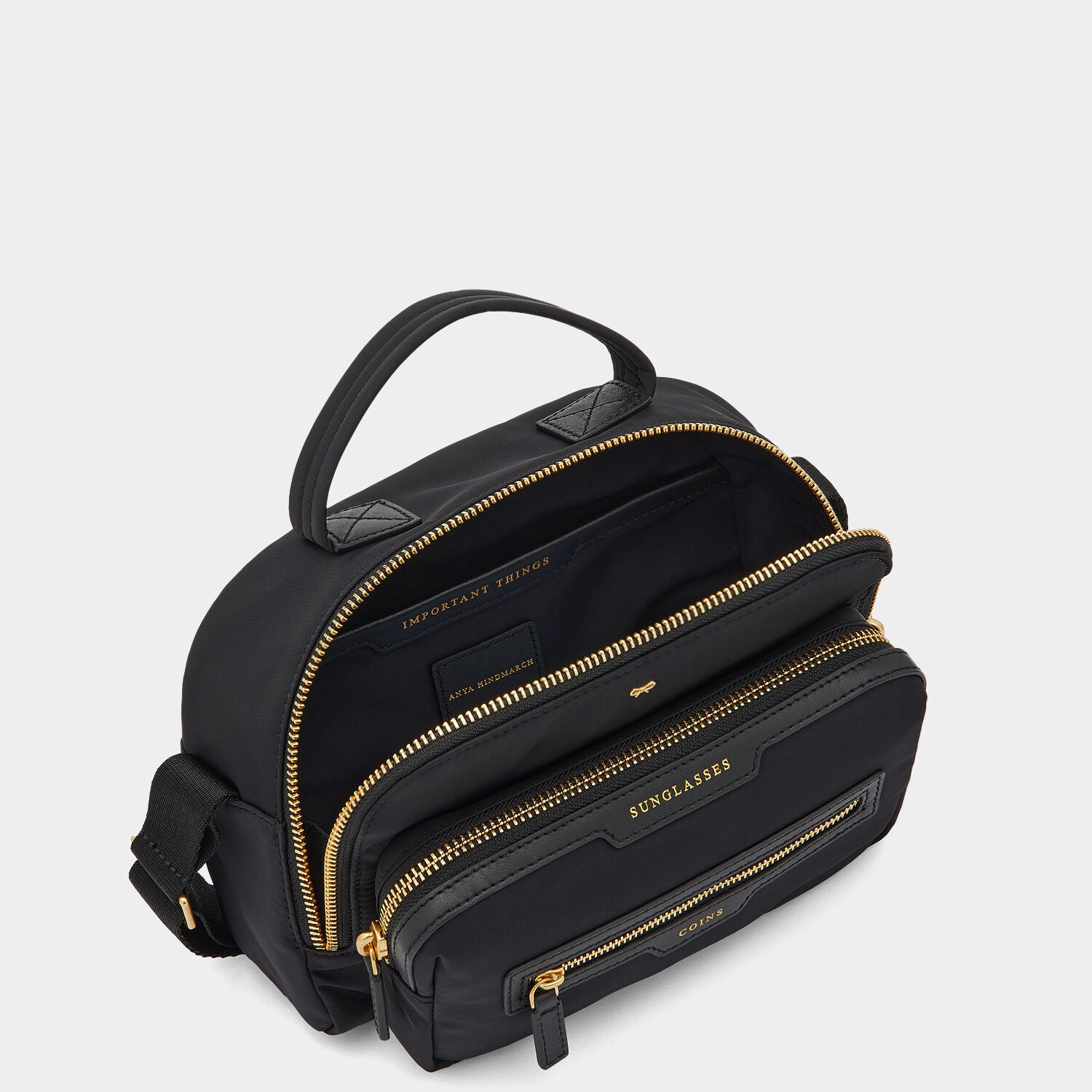 Multi Pocket Cross-body -

                  
                    Regenerated Econyl® in Black -
                  

                  Anya Hindmarch UK
