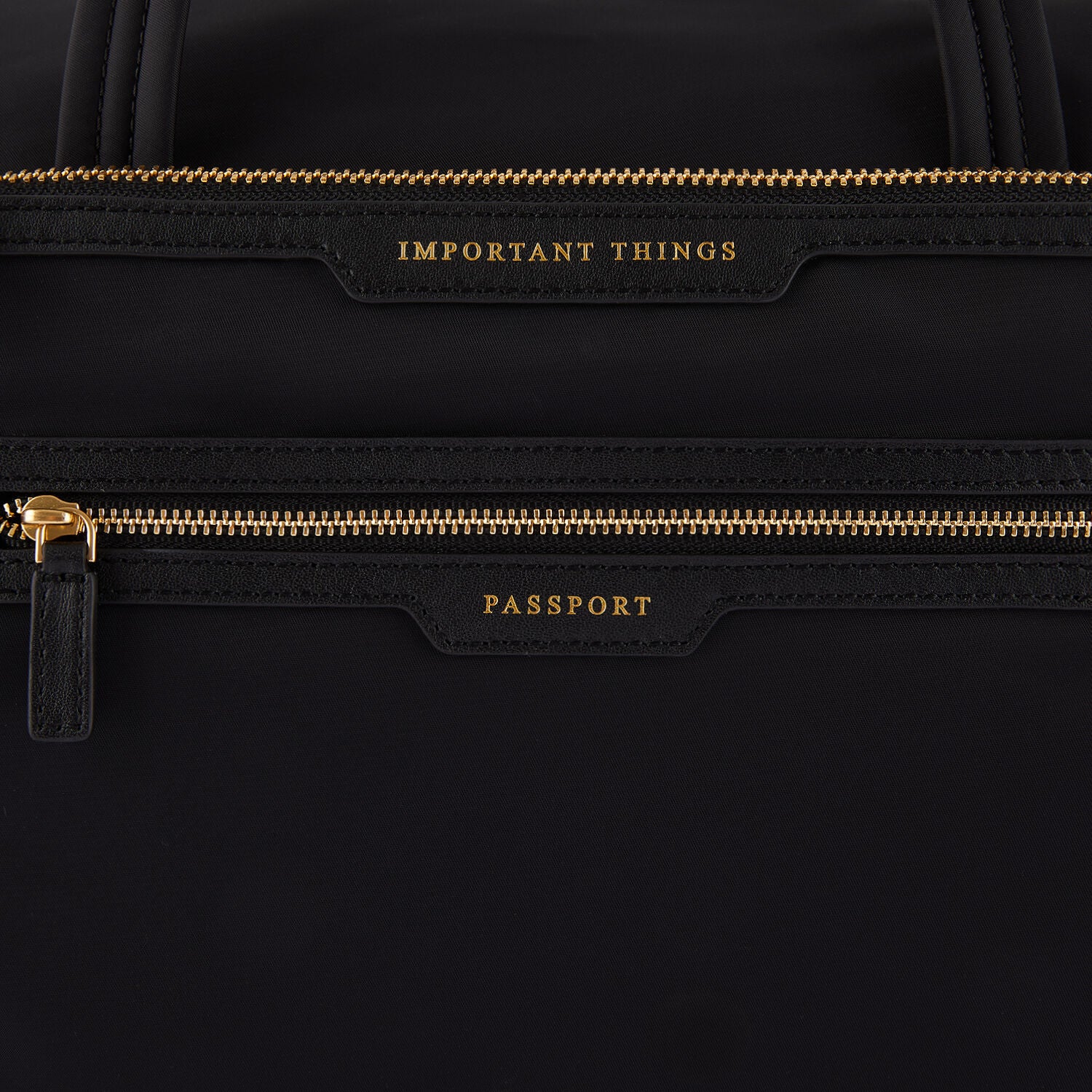 In-Flight Bag -

                  
                    Regenerated ECONYL® in Black -
                  

                  Anya Hindmarch UK
