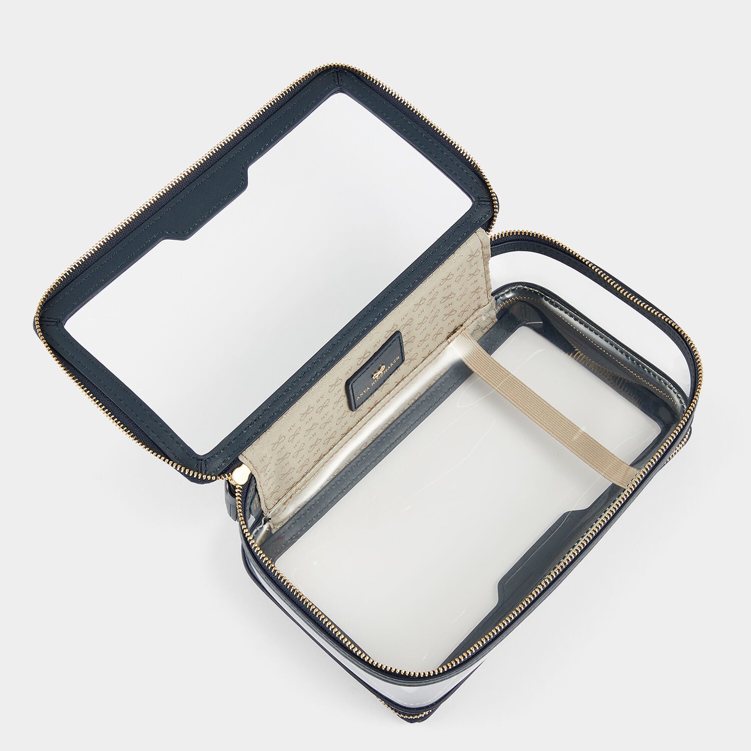 In-Flight Case -

                  
                    Capra in Clear/Marine -
                  

                  Anya Hindmarch UK
