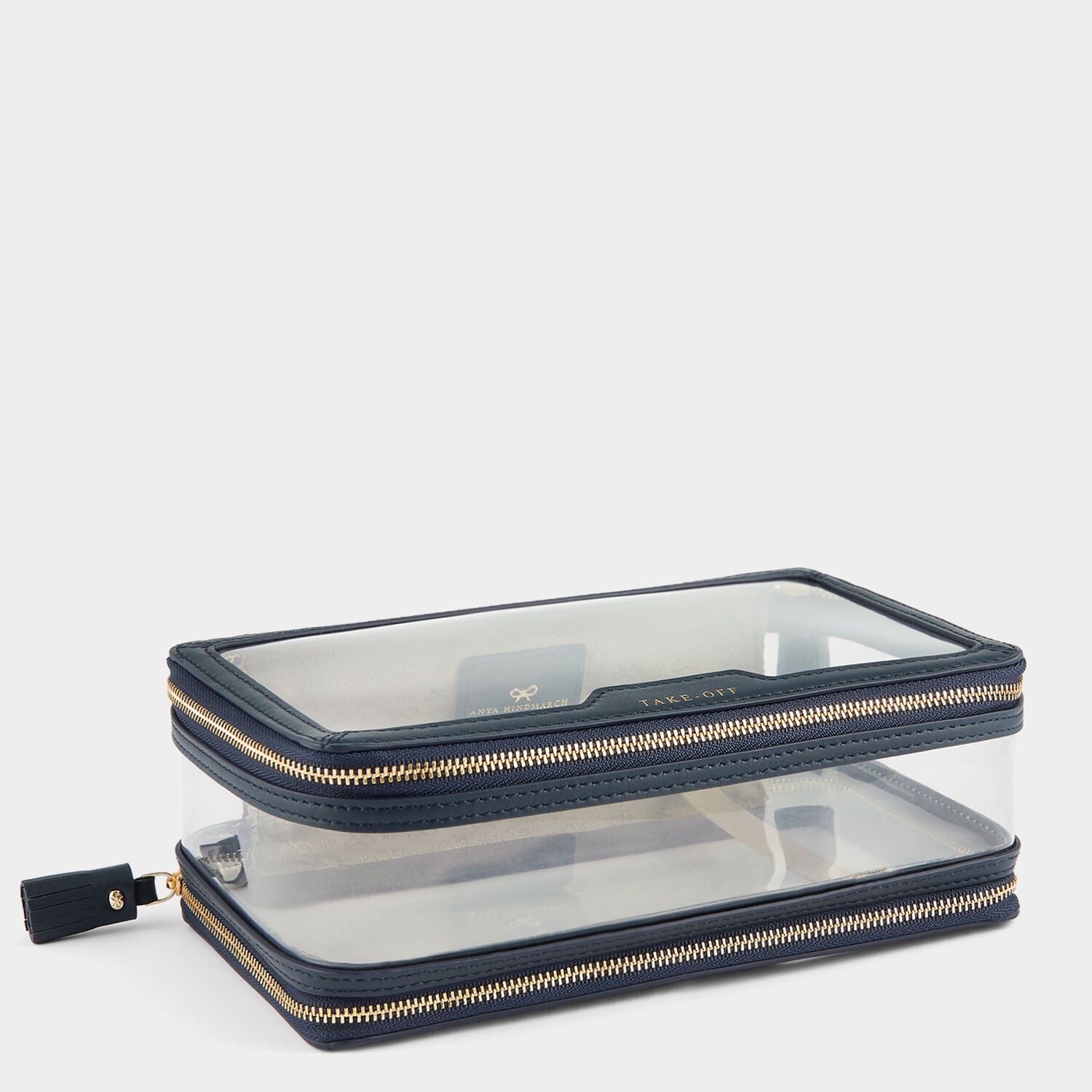 In-Flight Case -

                  
                    Capra in Clear/Marine -
                  

                  Anya Hindmarch UK
