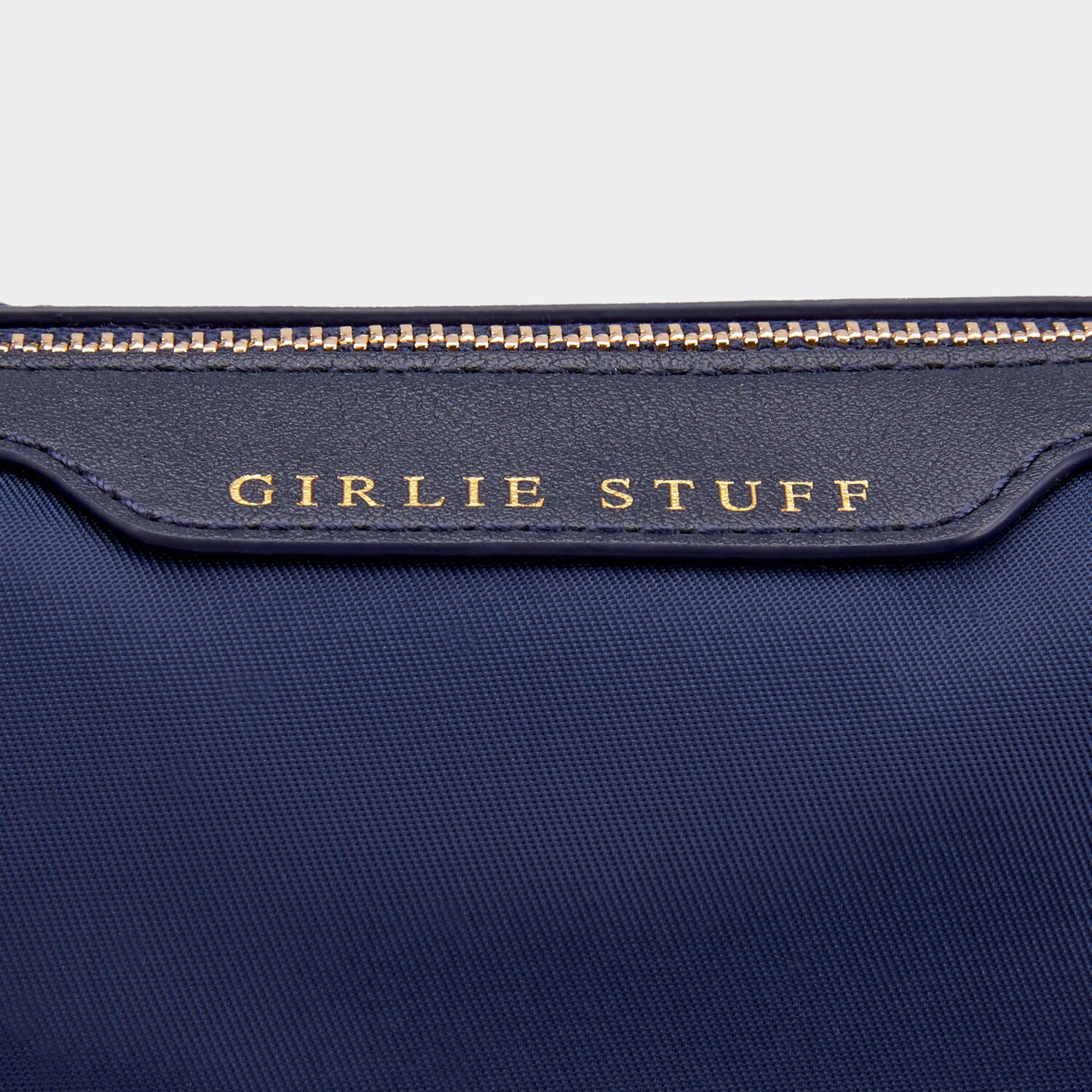 Girlie Stuff Pouch -

                  
                    Econyl® Regenerated Nylon in Marine -
                  

                  Anya Hindmarch UK
