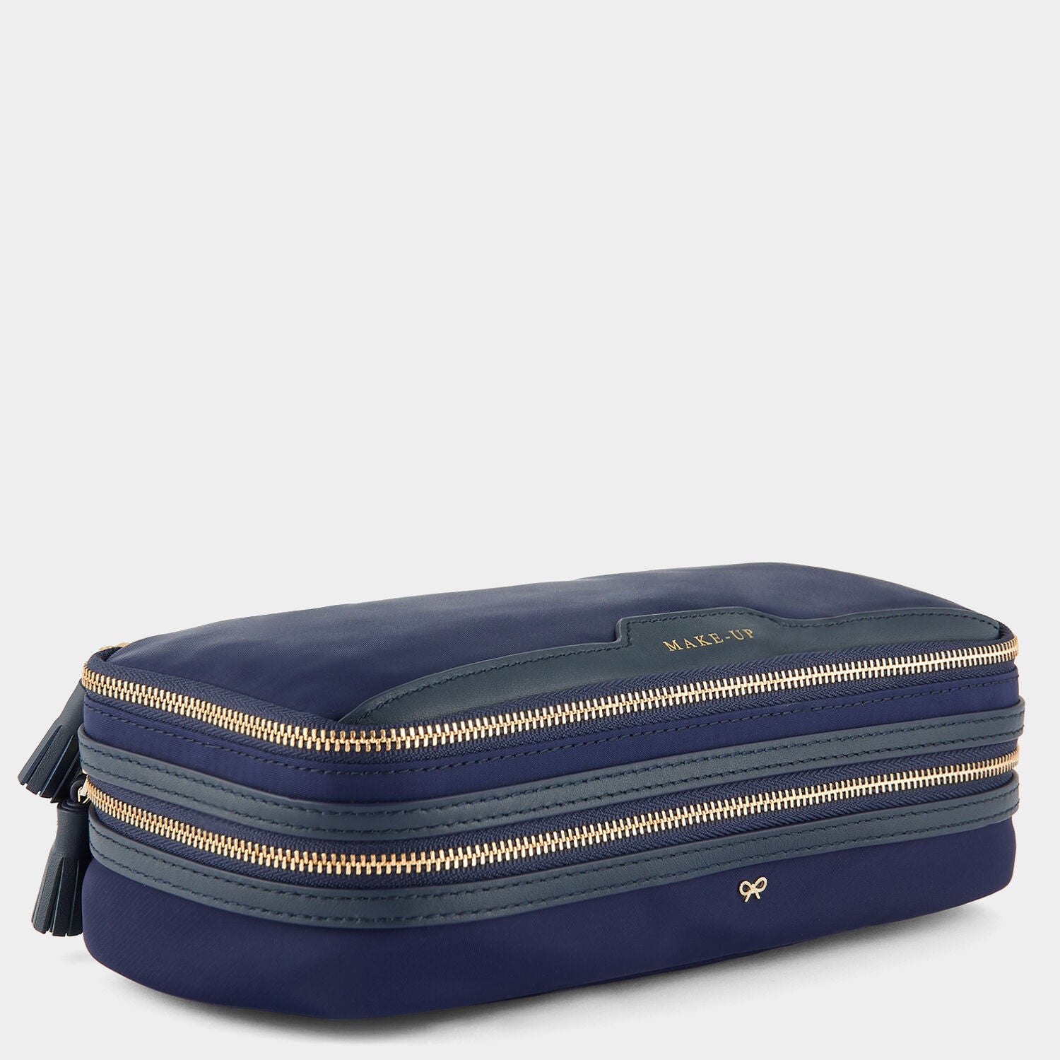 Make-Up Pouch -

                  
                    ECONYL® Regenerated Nylon in Dark Marine -
                  

                  Anya Hindmarch UK
