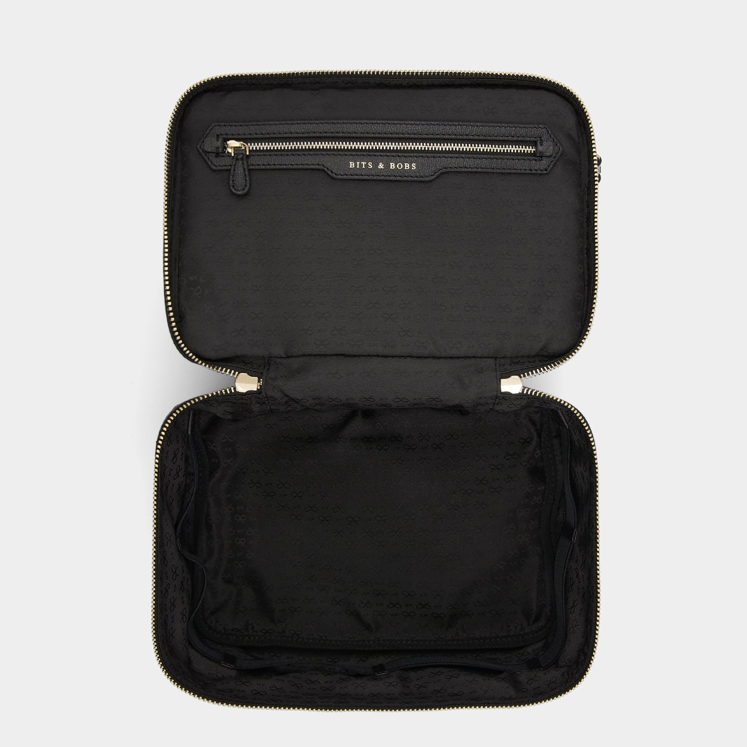 Vanity Kit -

                  
                    ECONYL® Regenerated Nylon in Black -
                  

                  Anya Hindmarch UK
