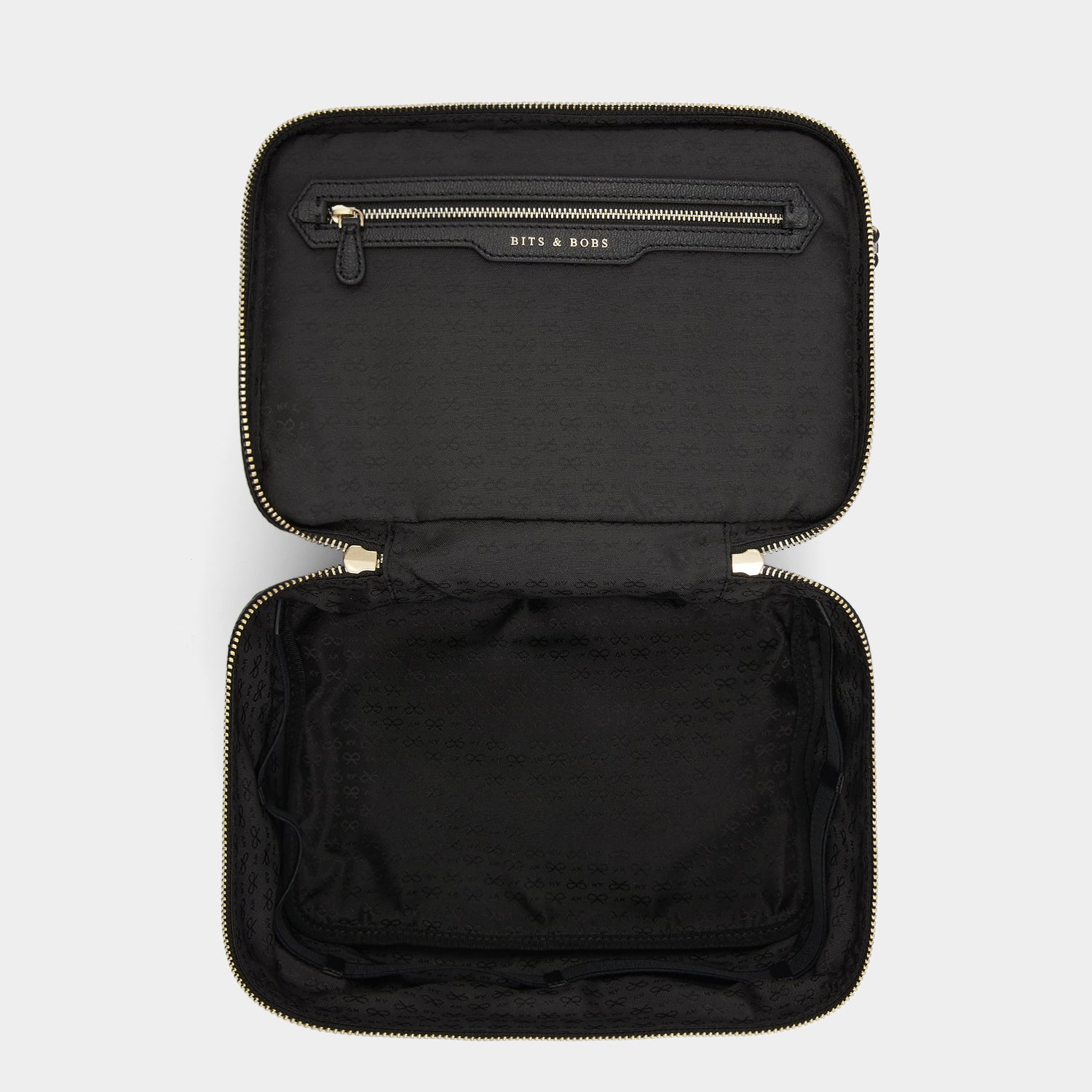 Vanity Kit -

                  
                    Econyl® Regenerated Nylon in Black -
                  

                  Anya Hindmarch UK
