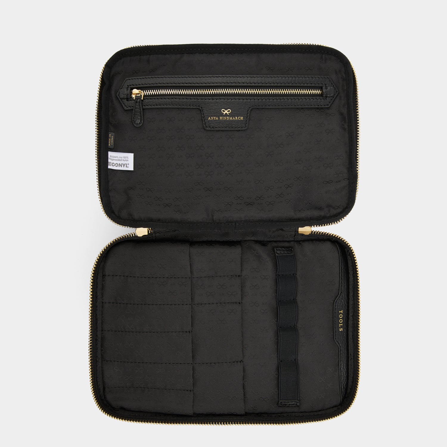 Vanity Kit -

                  
                    Econyl® Regenerated Nylon in Black -
                  

                  Anya Hindmarch UK
