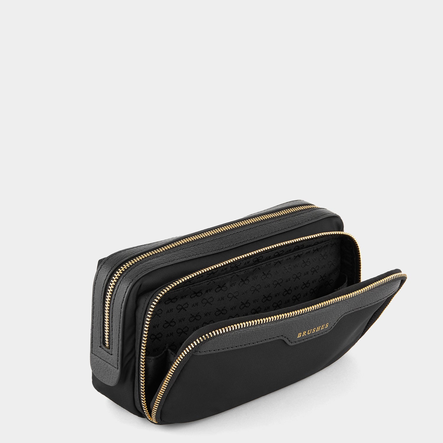 Small Make-Up Pouch -

                  
                    ECONYL® regenerated Nylon in Black -
                  

                  Anya Hindmarch UK
