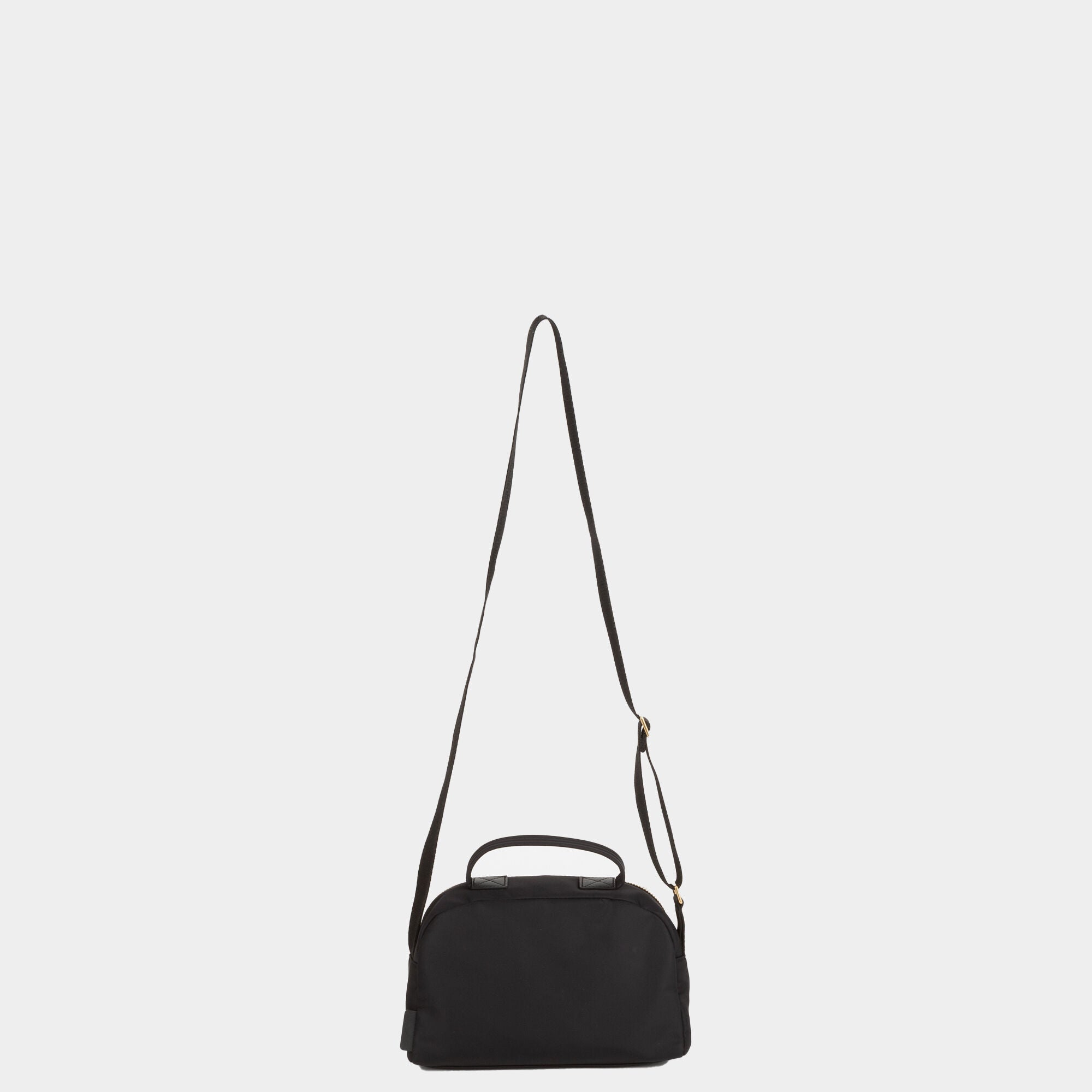 Eyes Cross-body Pouch -

                  
                    ECONYL® Regenerated Nylon in Black -
                  

                  Anya Hindmarch UK
