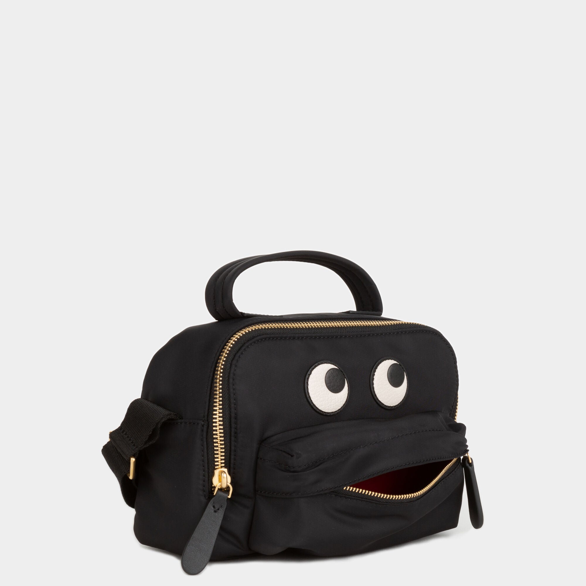 Eyes Cross-body Pouch -

                  
                    ECONYL® Regenerated Nylon in Black -
                  

                  Anya Hindmarch UK
