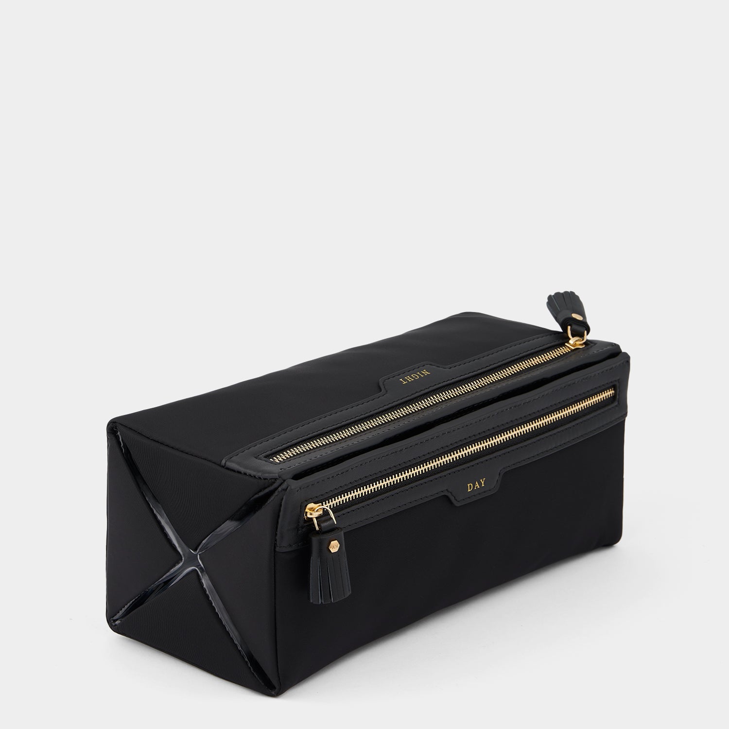 Night and Day Pouch -

                  
                    ECONYL® Regenerated Nylon in Black -
                  

                  Anya Hindmarch UK
