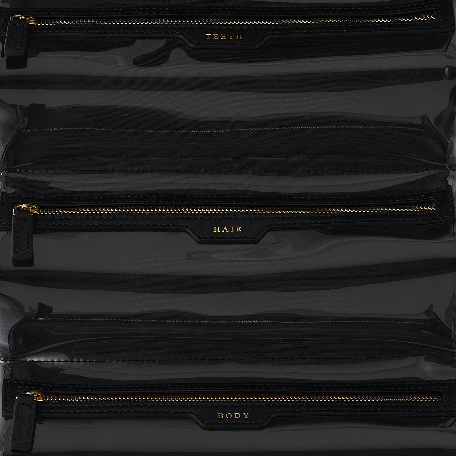 Night and Day Pouch -

                  
                    ECONYL® Regenerated Nylon in Black -
                  

                  Anya Hindmarch UK
