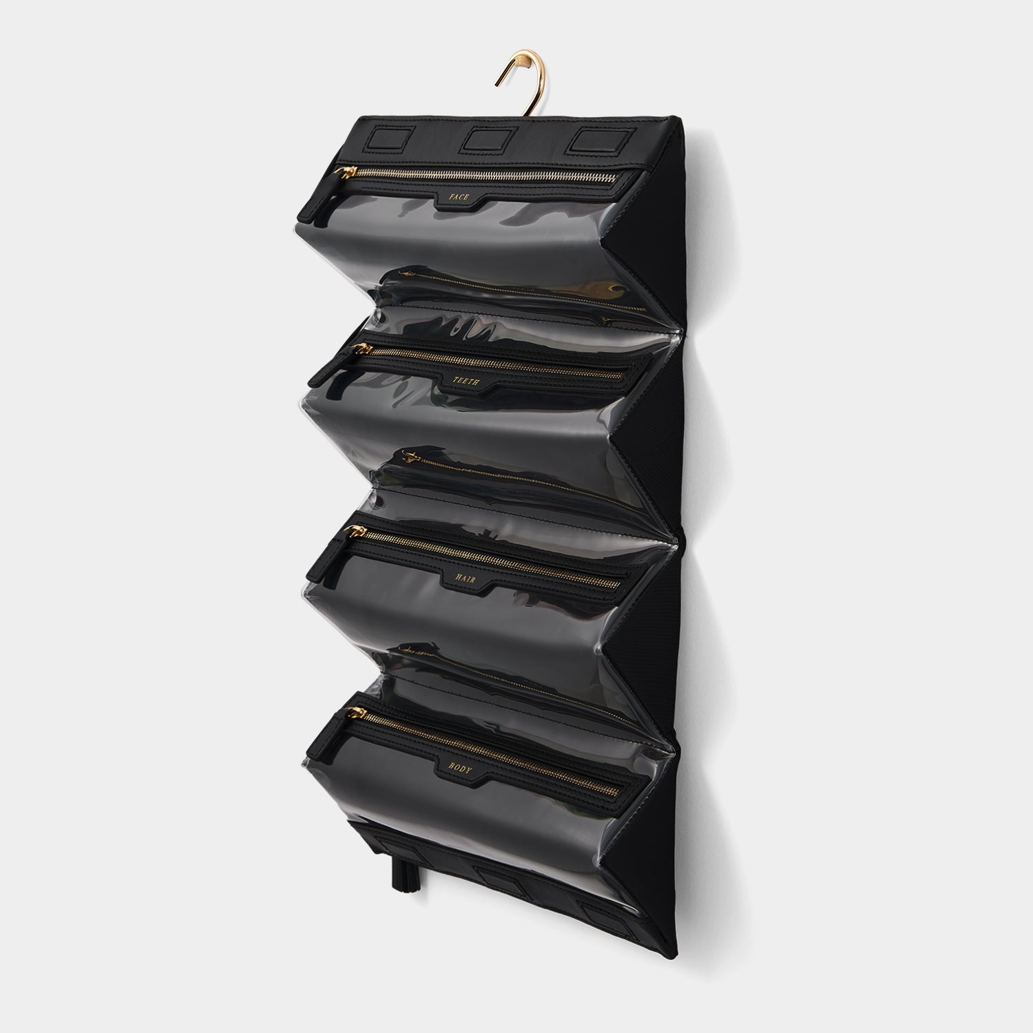 Night and Day Pouch -

                  
                    ECONYL® Regenerated Nylon in Black -
                  

                  Anya Hindmarch UK
