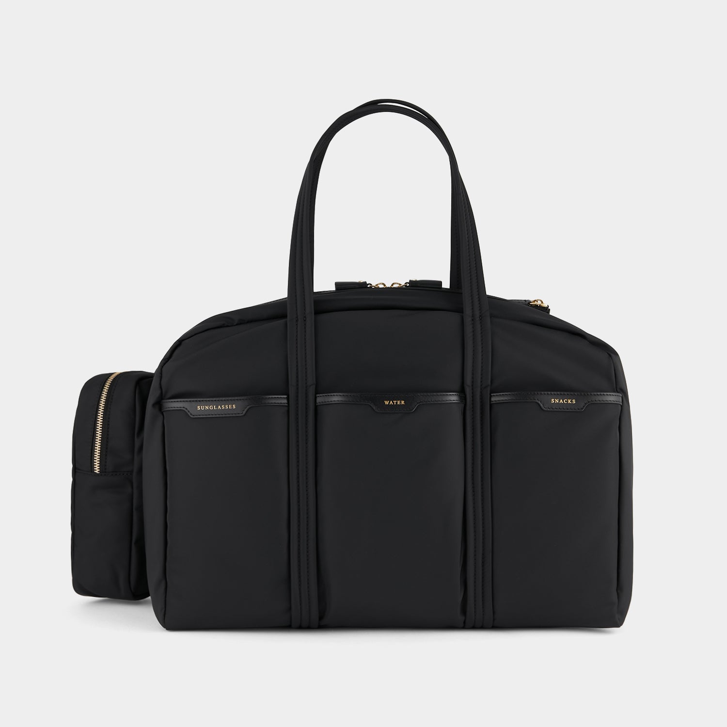 Tennis Bag -

                  
                    Econyl® Regenerated Nylon in Black -
                  

                  Anya Hindmarch UK
