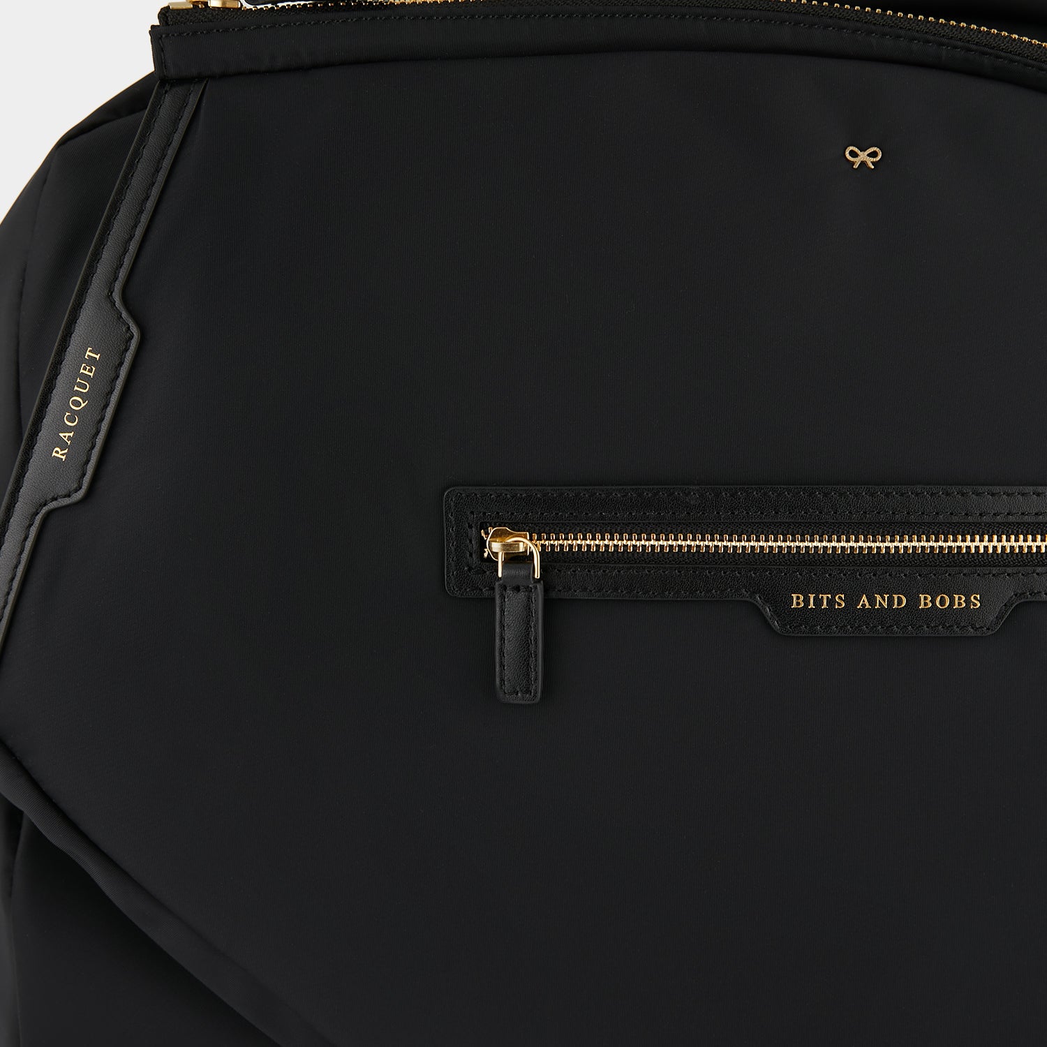 Tennis Bag -

                  
                    ECONYL® Regenerated Nylon in Black -
                  

                  Anya Hindmarch UK
