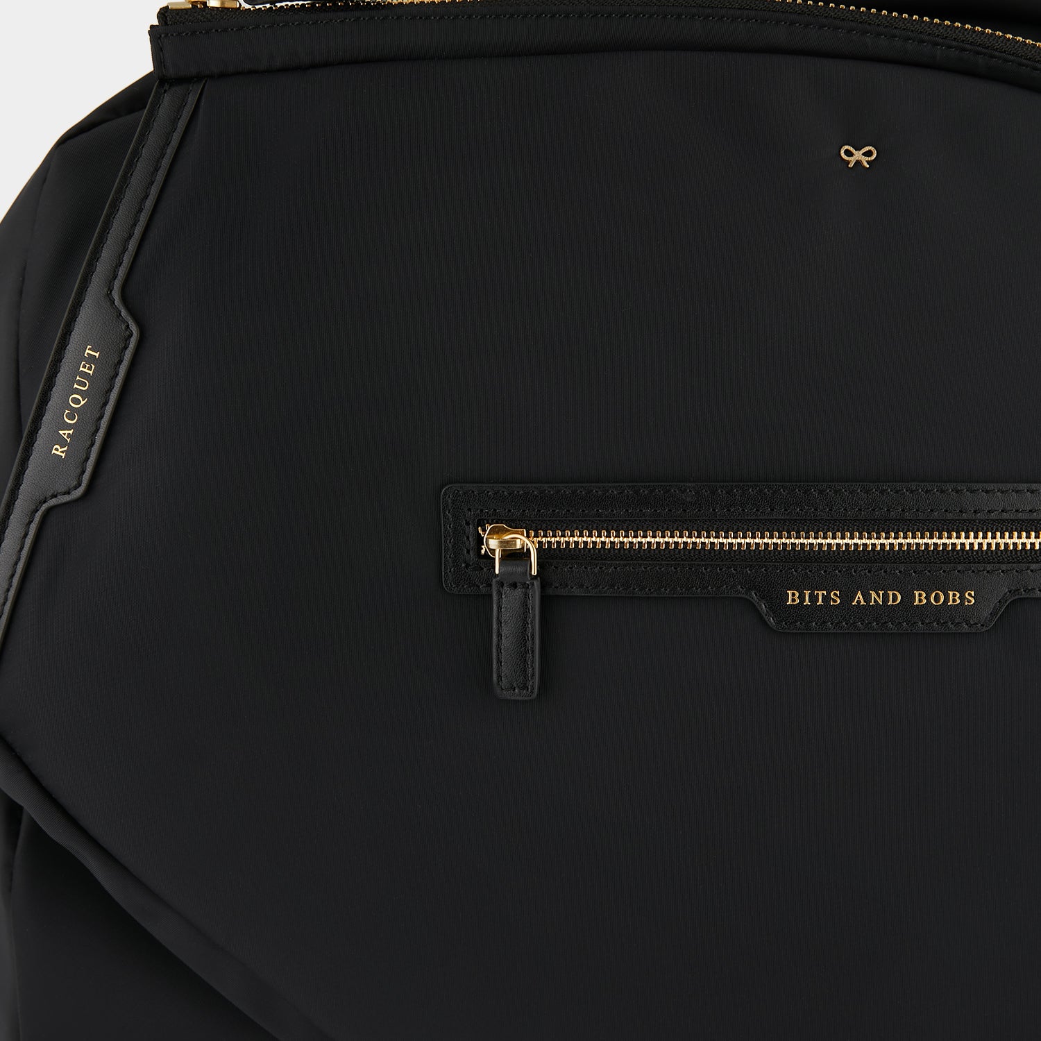 Tennis Bag -

                  
                    Econyl® Regenerated Nylon in Black -
                  

                  Anya Hindmarch UK
