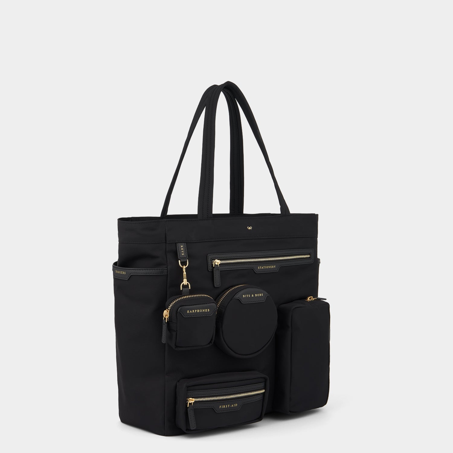 Commuter Tote -

                  
                    Regenerated Econyl® in Black -
                  

                  Anya Hindmarch UK
