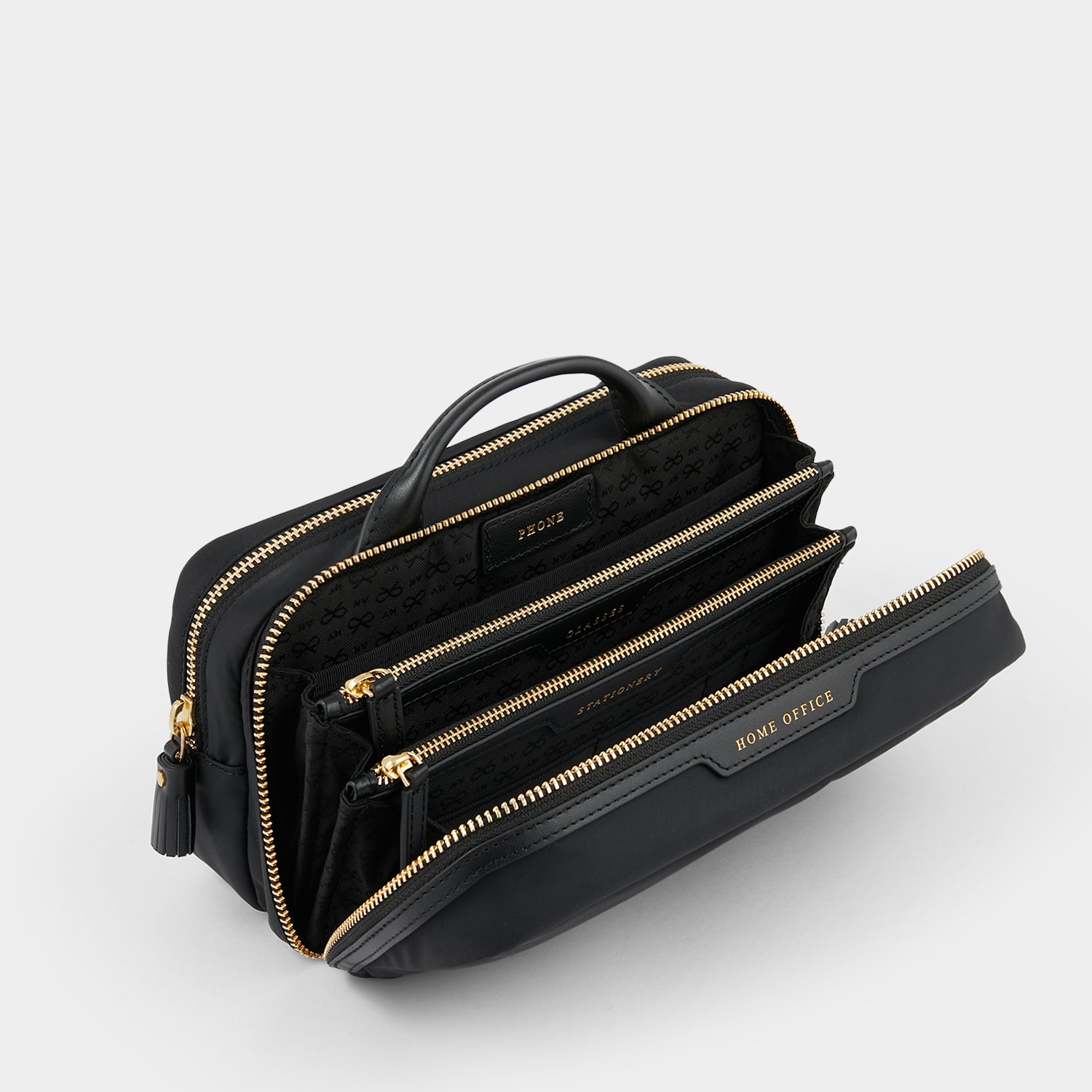 Home Office Pouch -

                  
                    ECONYL® Regenerated Nylon in Black -
                  

                  Anya Hindmarch UK
